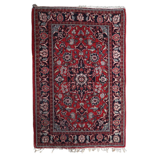 Vintage Hamadan rug with deep red field and central medallion


