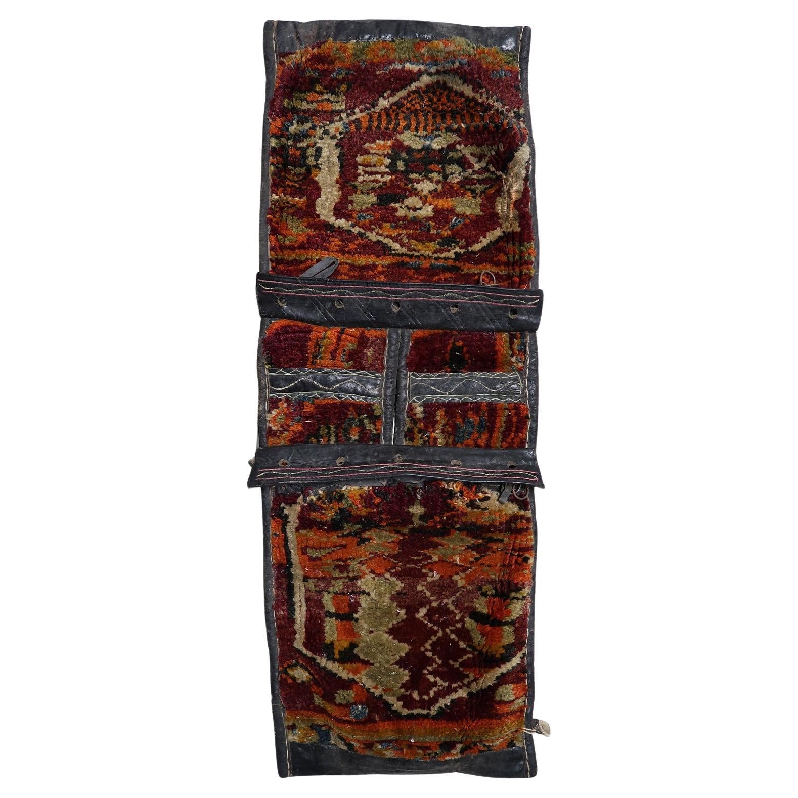 Antique Kurdish saddle bag with two woven panels

