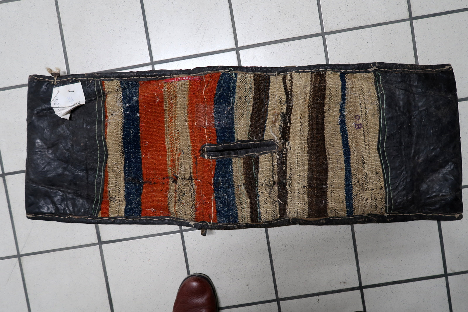 Leather border detail with aged patina

