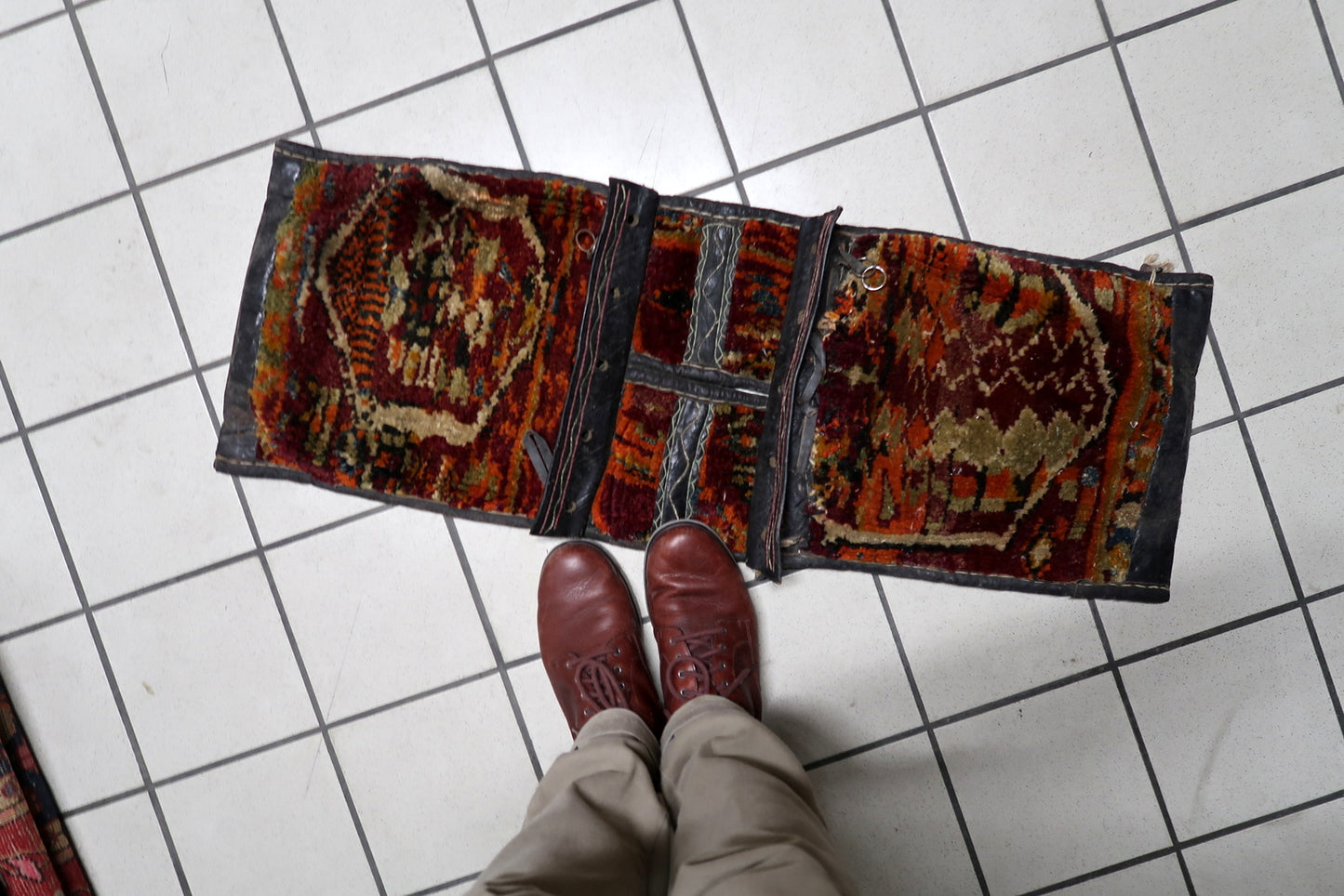 Textural contrast between wool and leather materials

