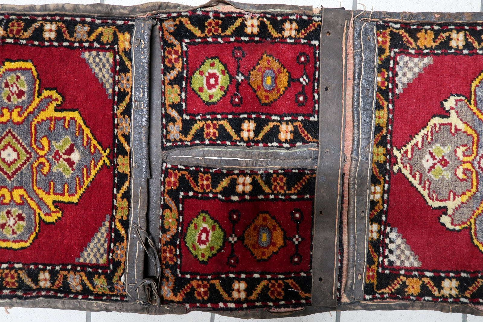 Close-up of bold black and yellow nomadic patterns

