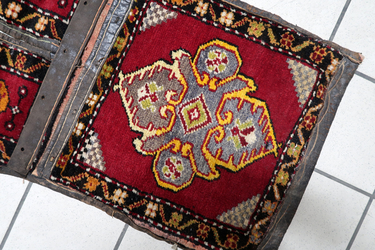 Central plain-weave band with rustic textile bindings

