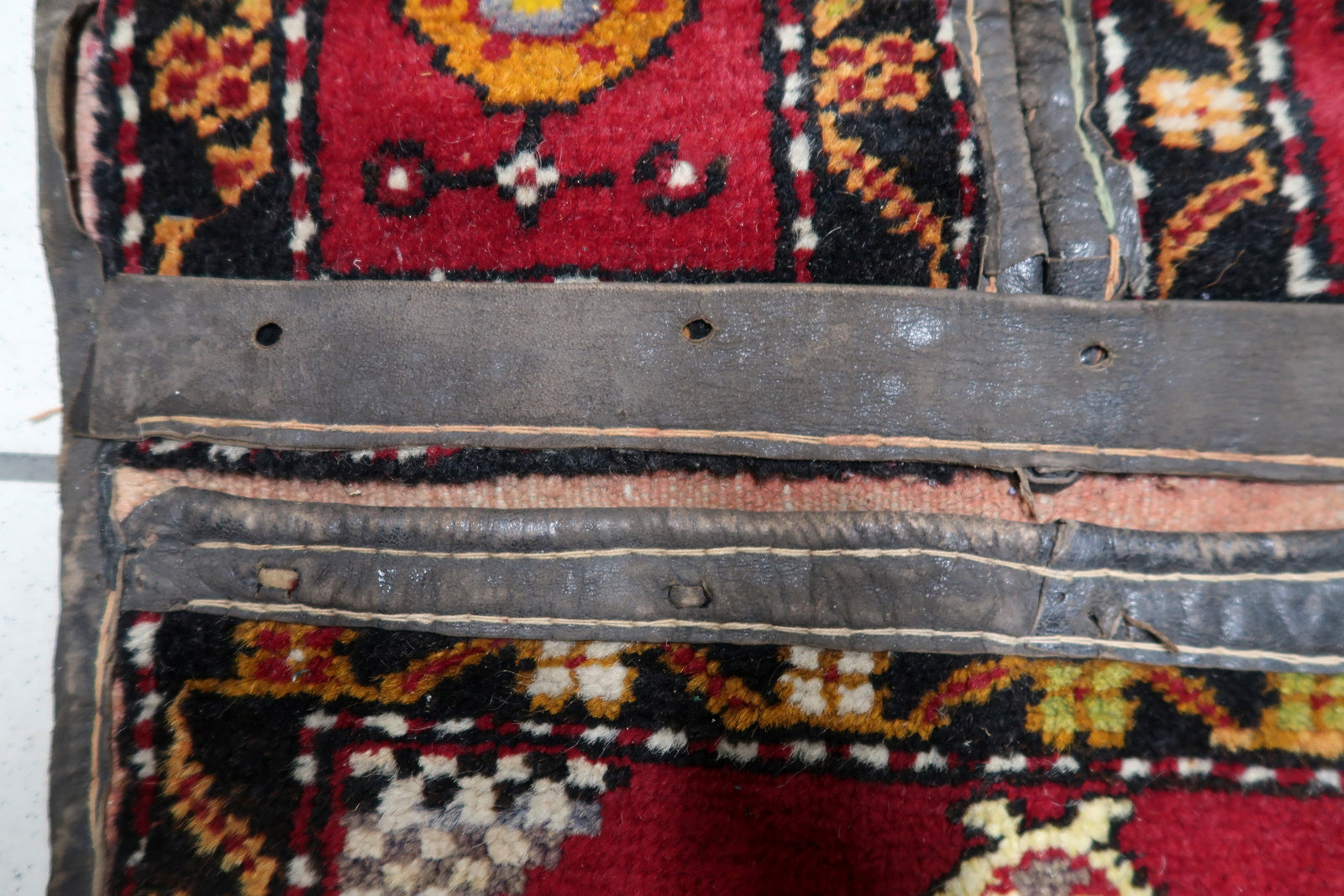 Textured wool weaving showing dense tribal craftsmanship

