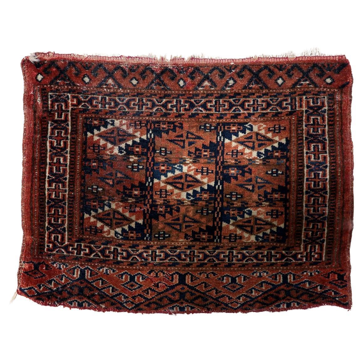 Antique Turkmen Yomud mat with geometric gul motifs

