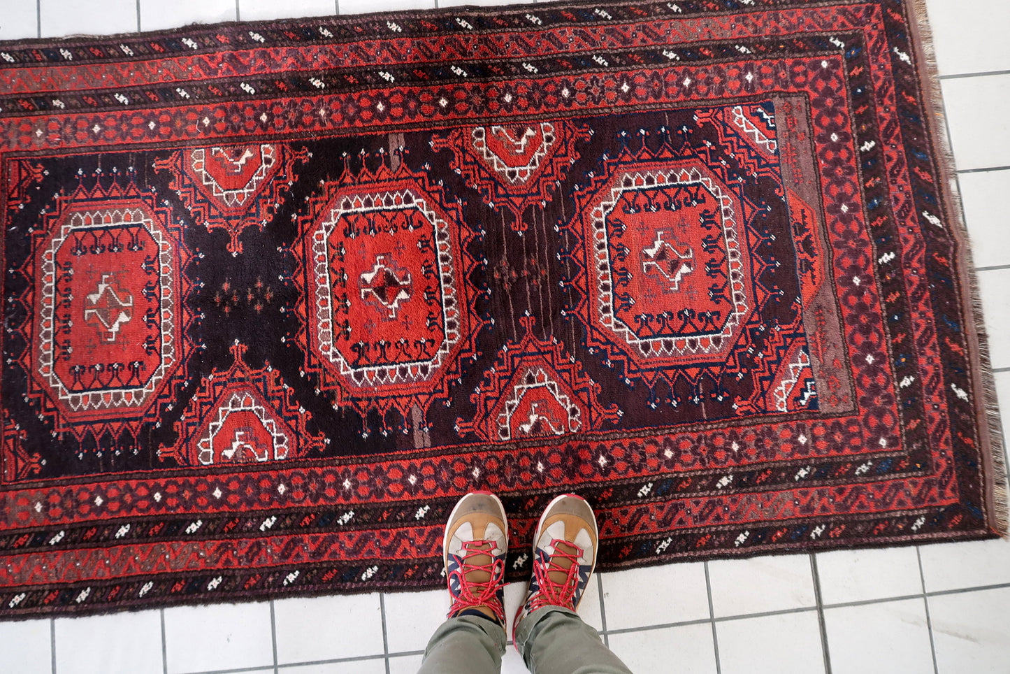 Texture shot showing the flat, durable weave of the hand-spun wool.

