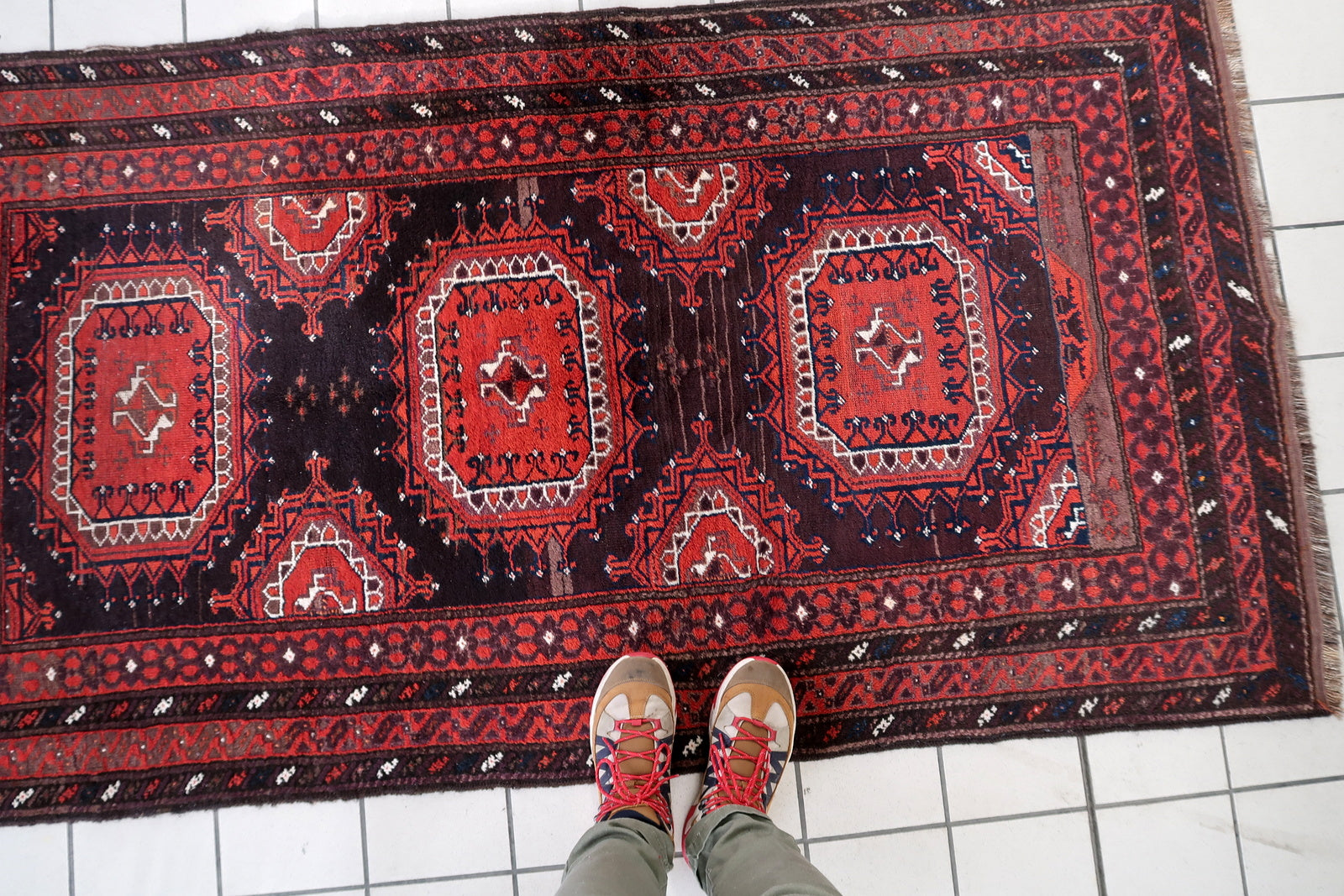 Texture shot showing the flat, durable weave of the hand-spun wool.

