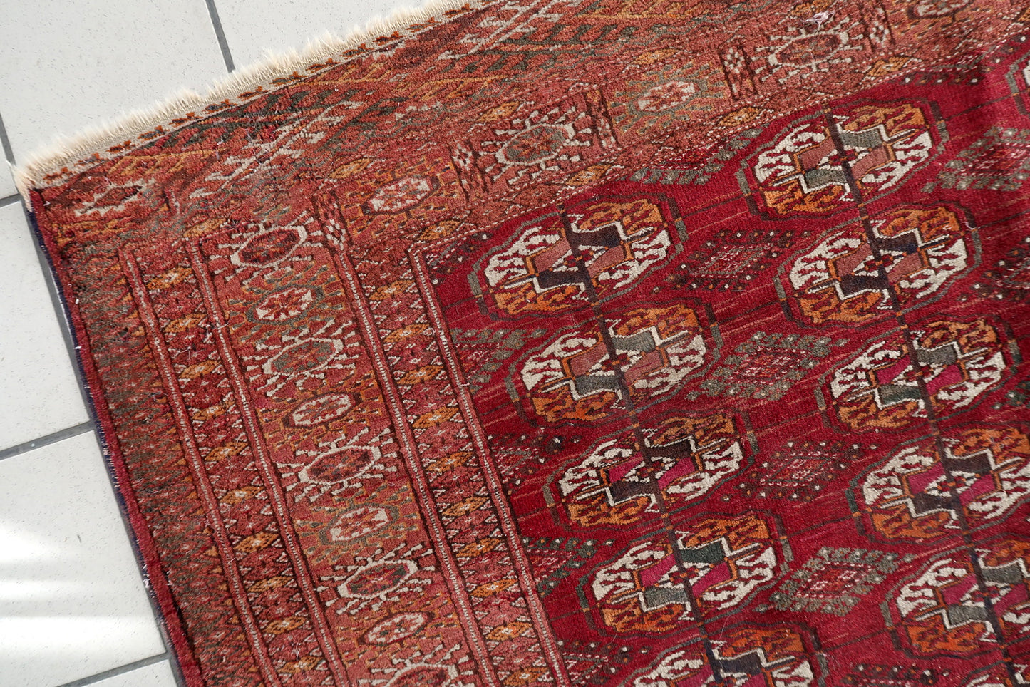 Close-up on the saffron yellow and soft green accents within the design.

