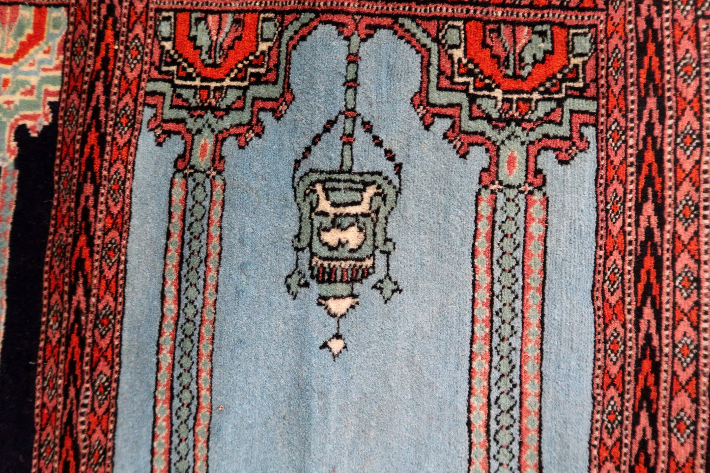 Angle shot capturing the runner's excellent vintage condition and patina.

