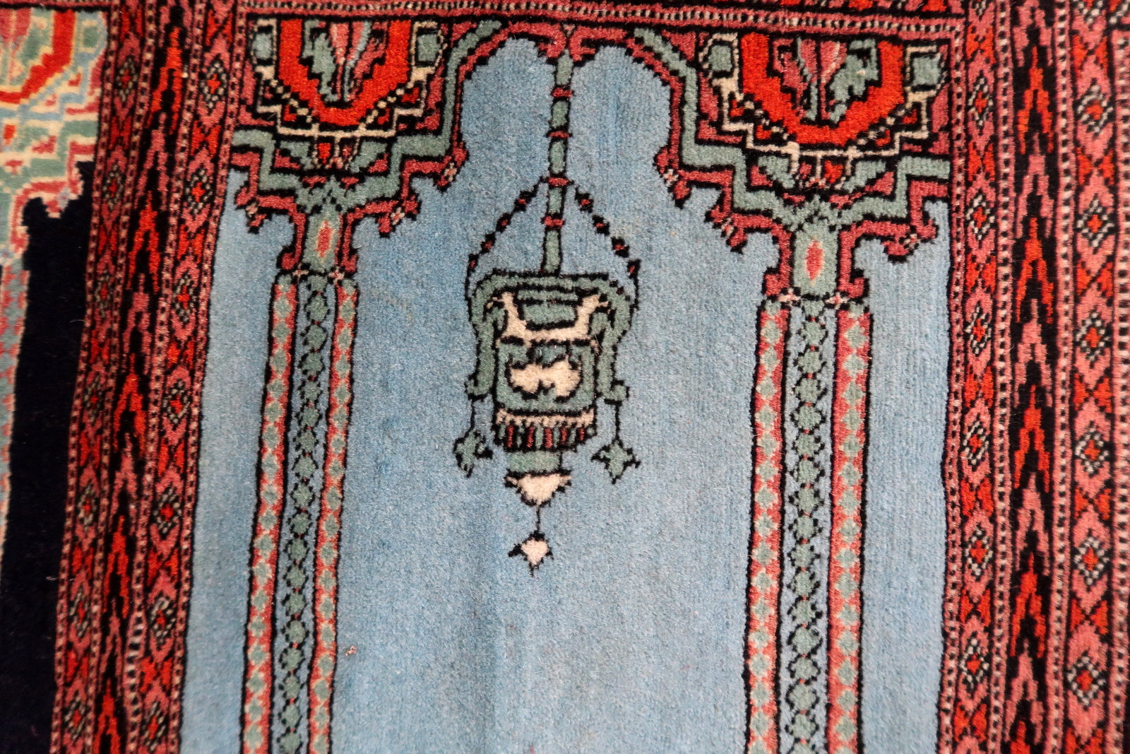 Angle shot capturing the runner's excellent vintage condition and patina.

