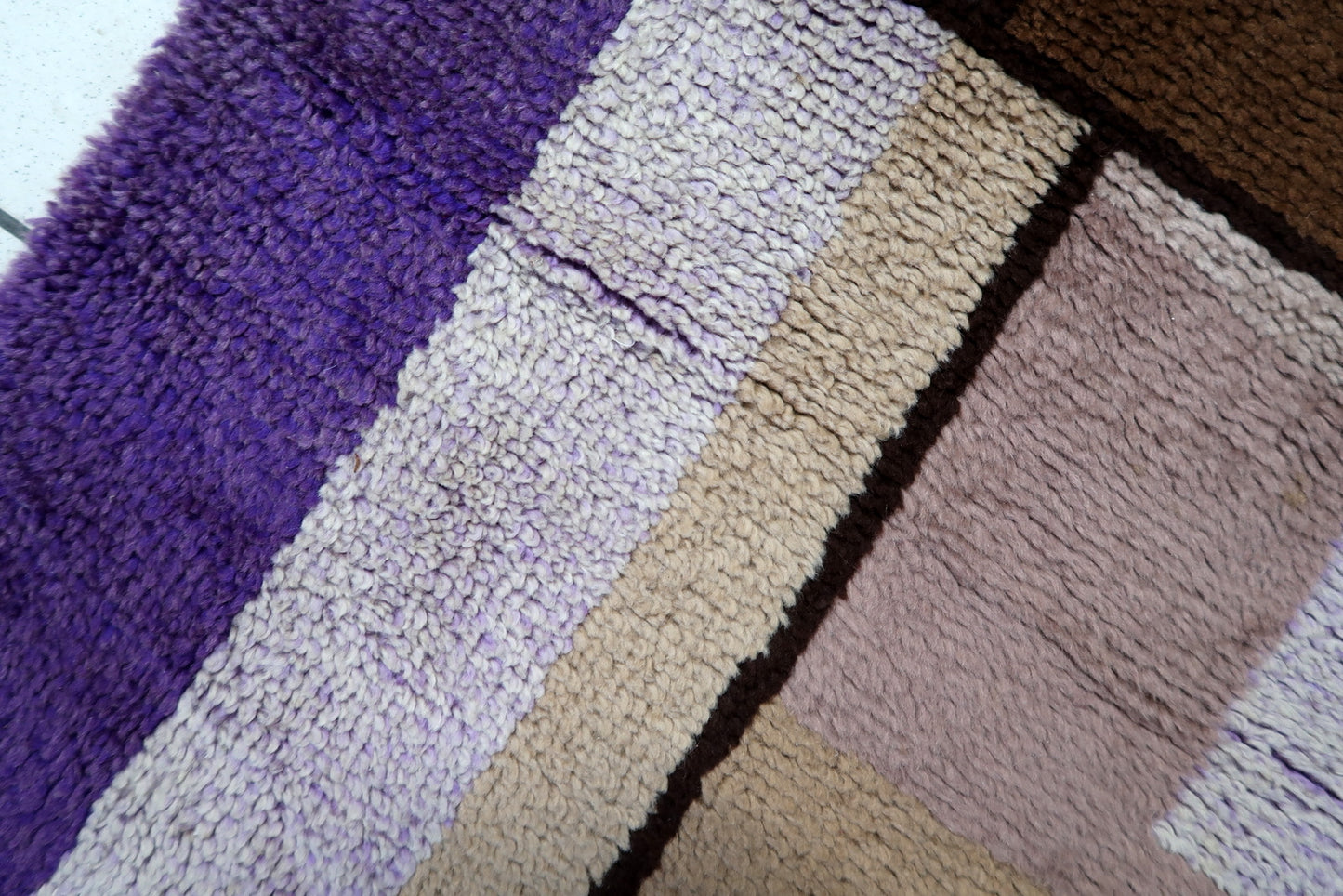 Close-up on the minor, character-consistent wear on the vintage surface.

