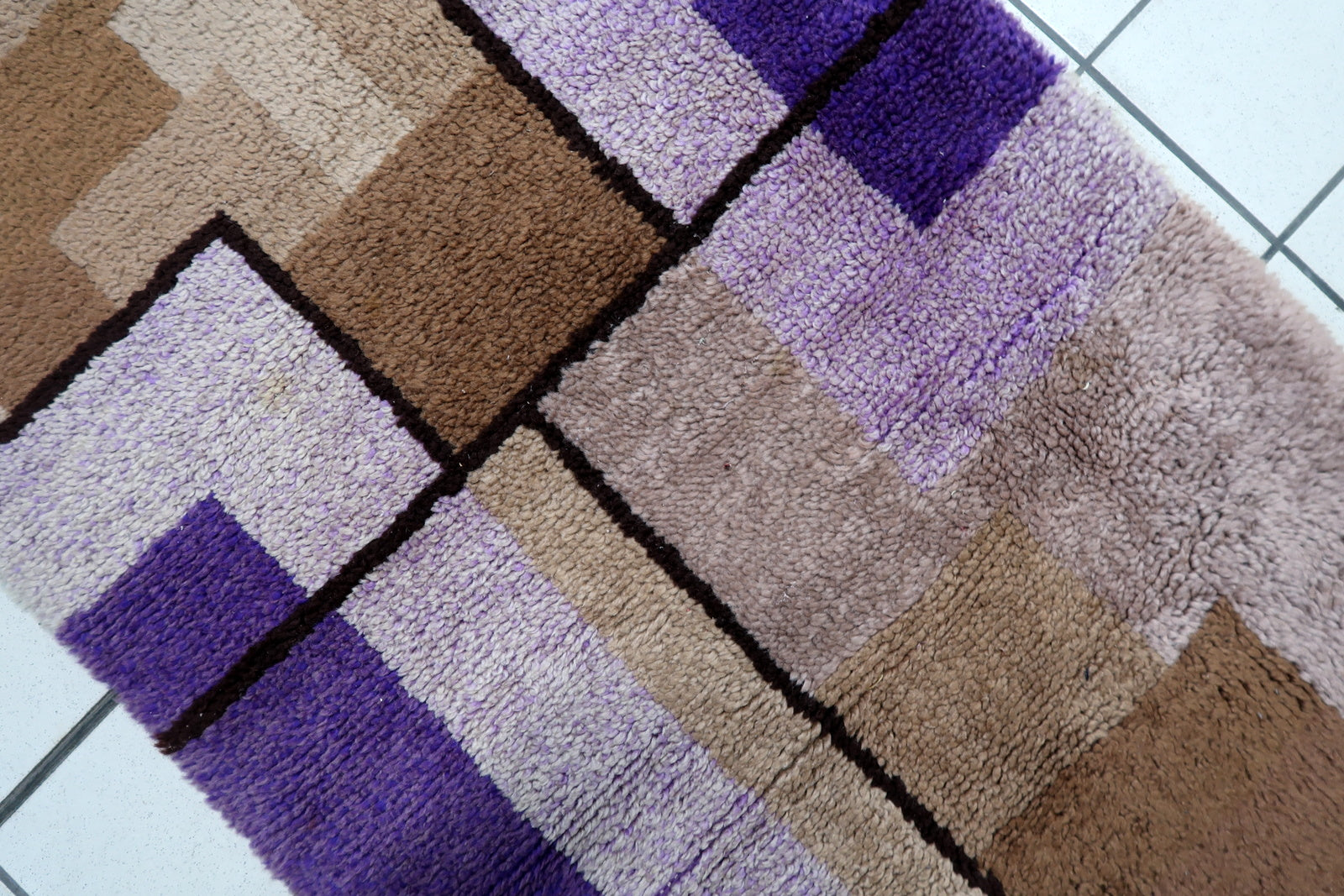 Shot focusing on the sophisticated color interplay of lavender, purple, and beige.

