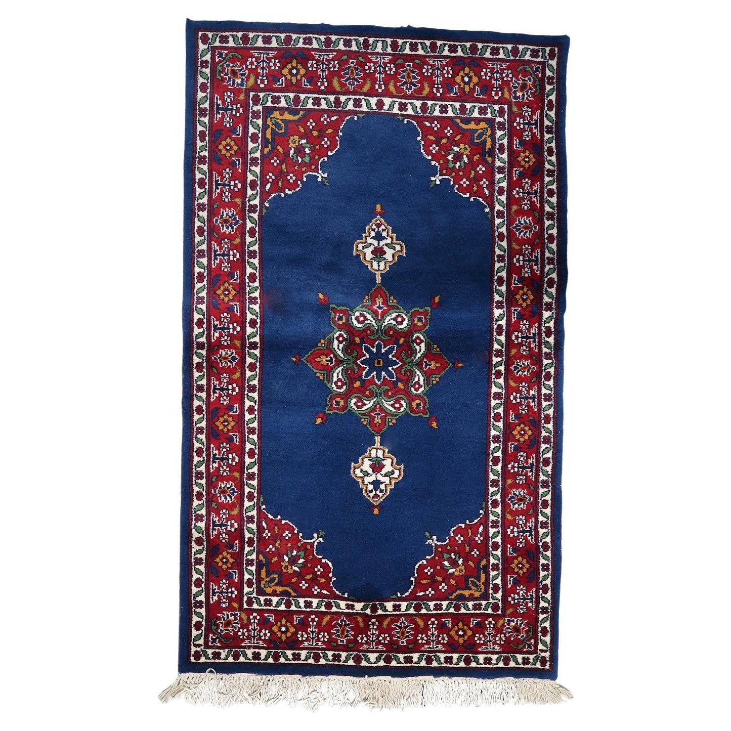 Full top view of the vintage Persian Kerman rug showing the intricate all-over or medallion design.


