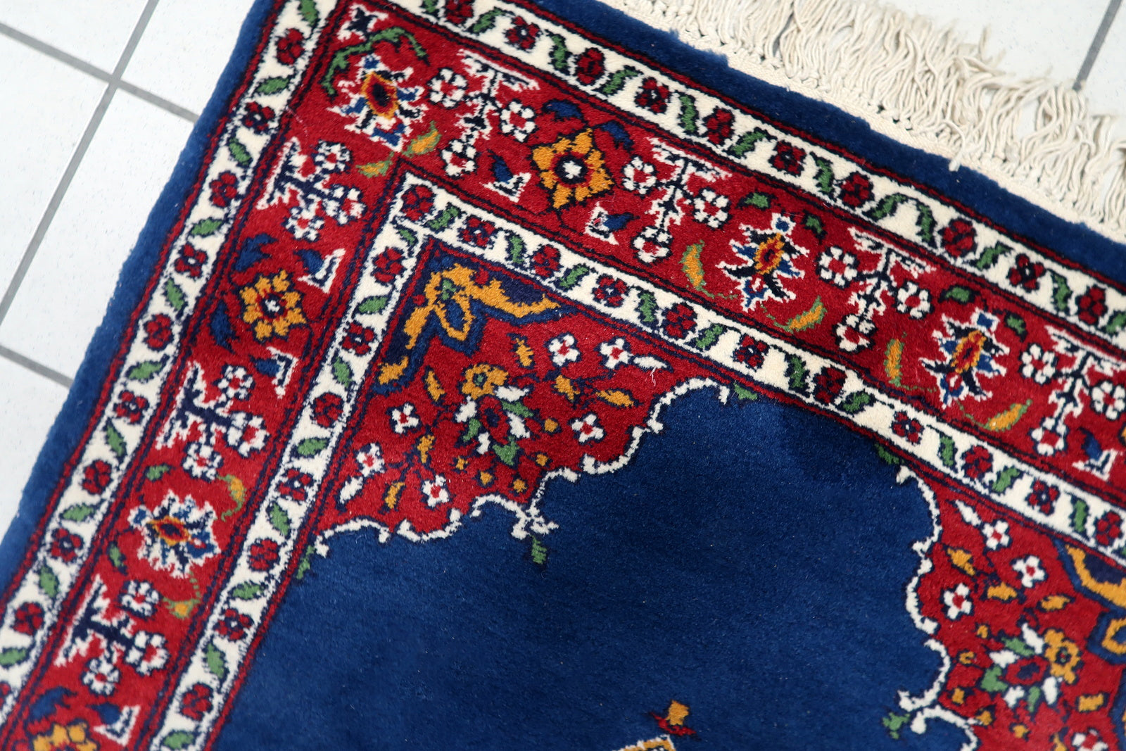 Shot focusing on the soft, luminous color palette of ivory, rose, and blue.

