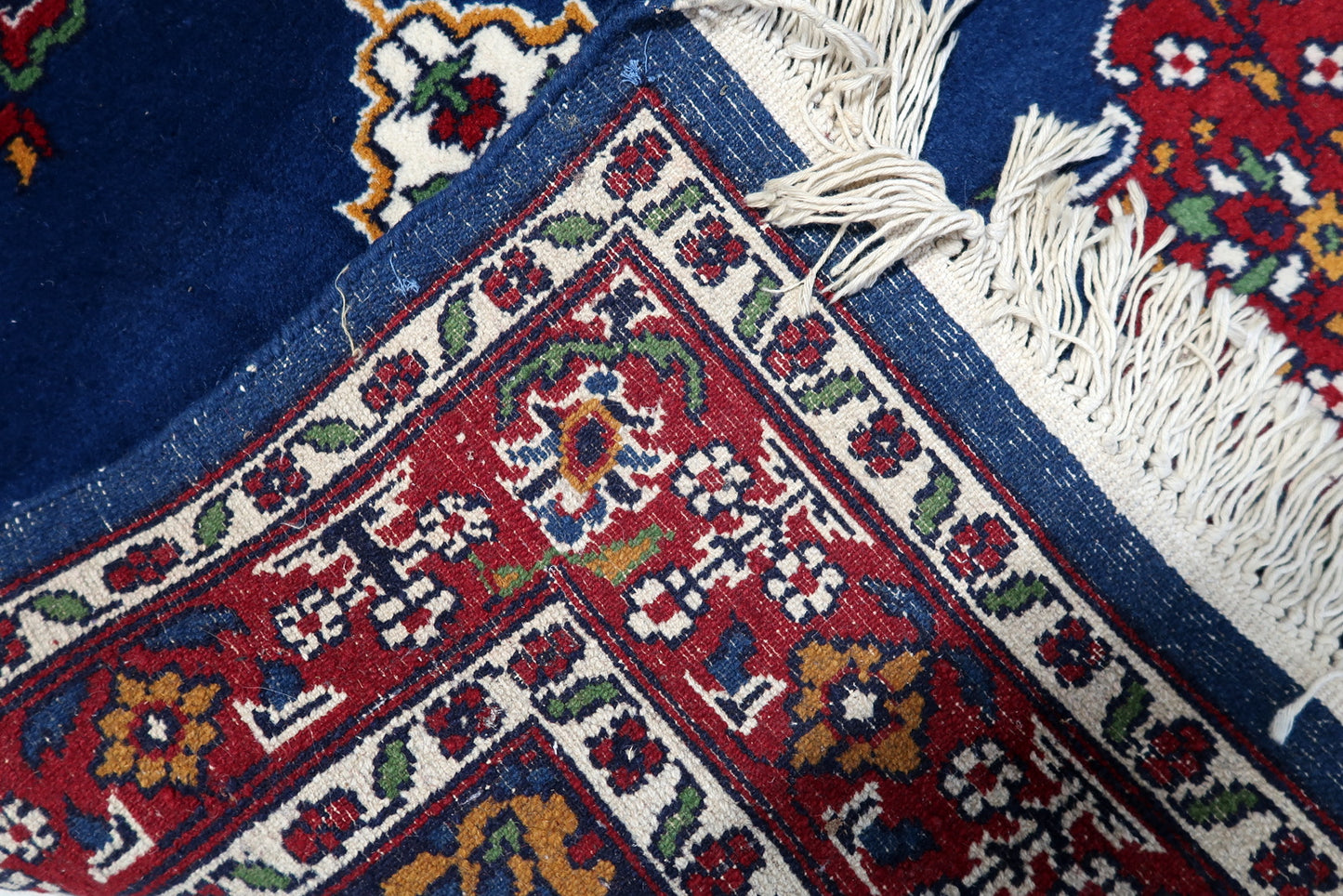 View of the rug's detailed and elaborate border.

