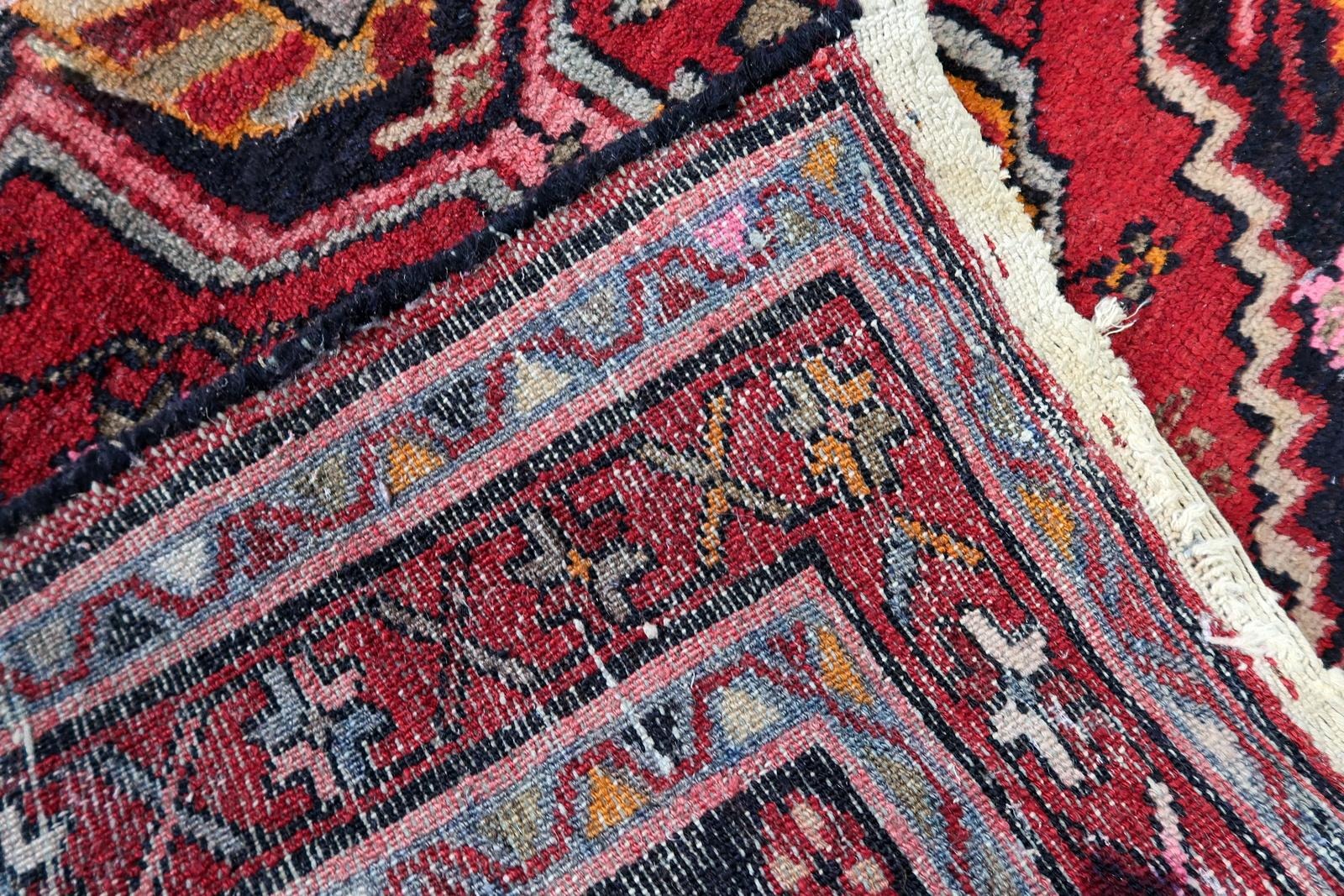 Early 20th-century Persian village weaving with harmonious palette and luminous aged colors.


