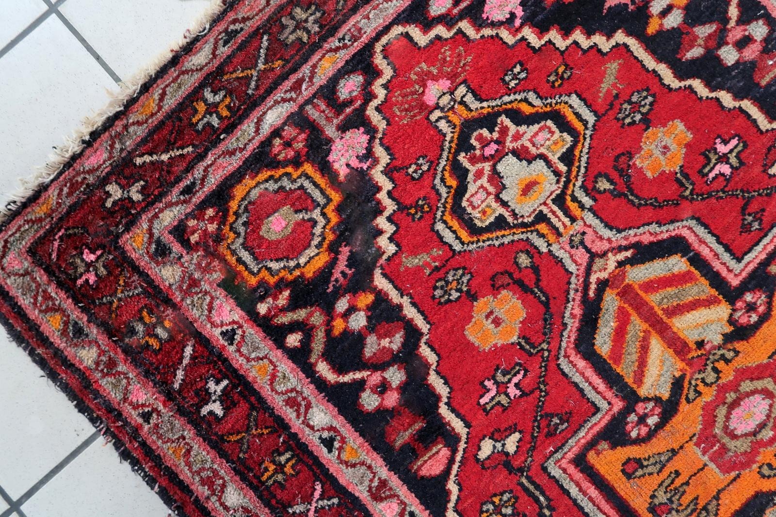 Decorative statement piece featuring a dynamic central composition and wide floral-patterned borders.

