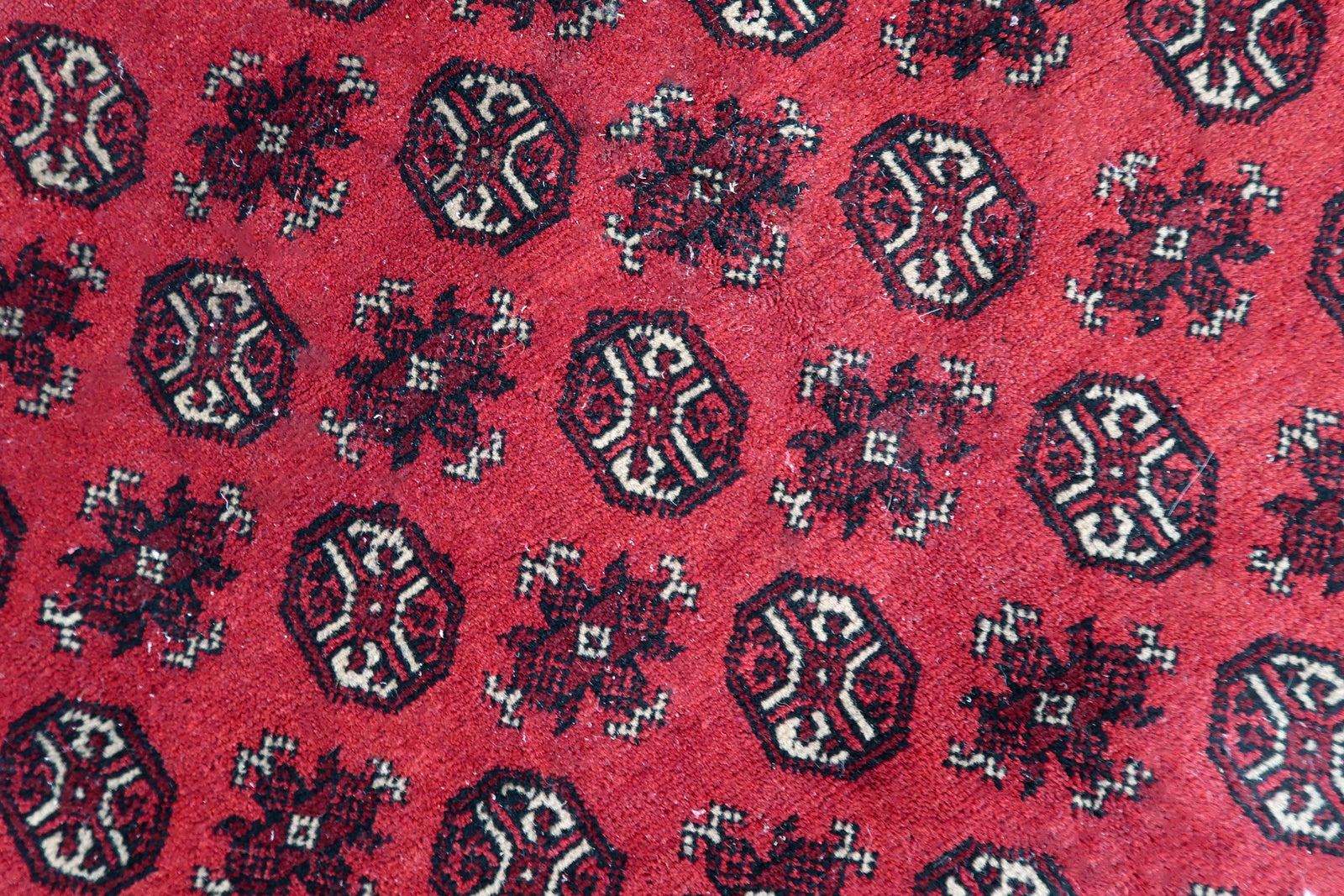 Antique Afghan Ersari Turkmen rug, hand-knotted wool, early 20th century.

