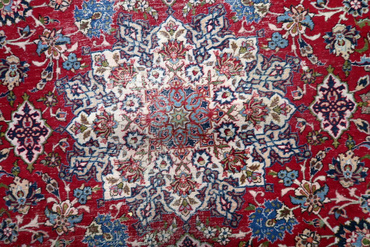 Traditional Persian Tabriz design with an all-over floral motif, perfect for complementing both classic and contemporary decor.

