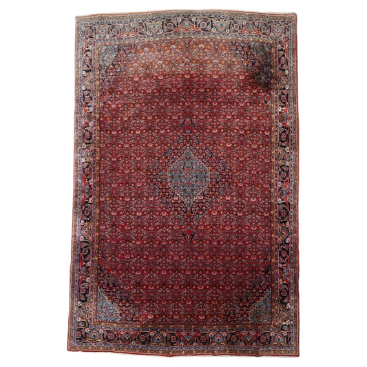 Antique Persian Bidjar "Iron Rug" from the 1920s, hand-knotted wool on cotton, featuring a central diamond medallion. 7.5' x 10.11'.

