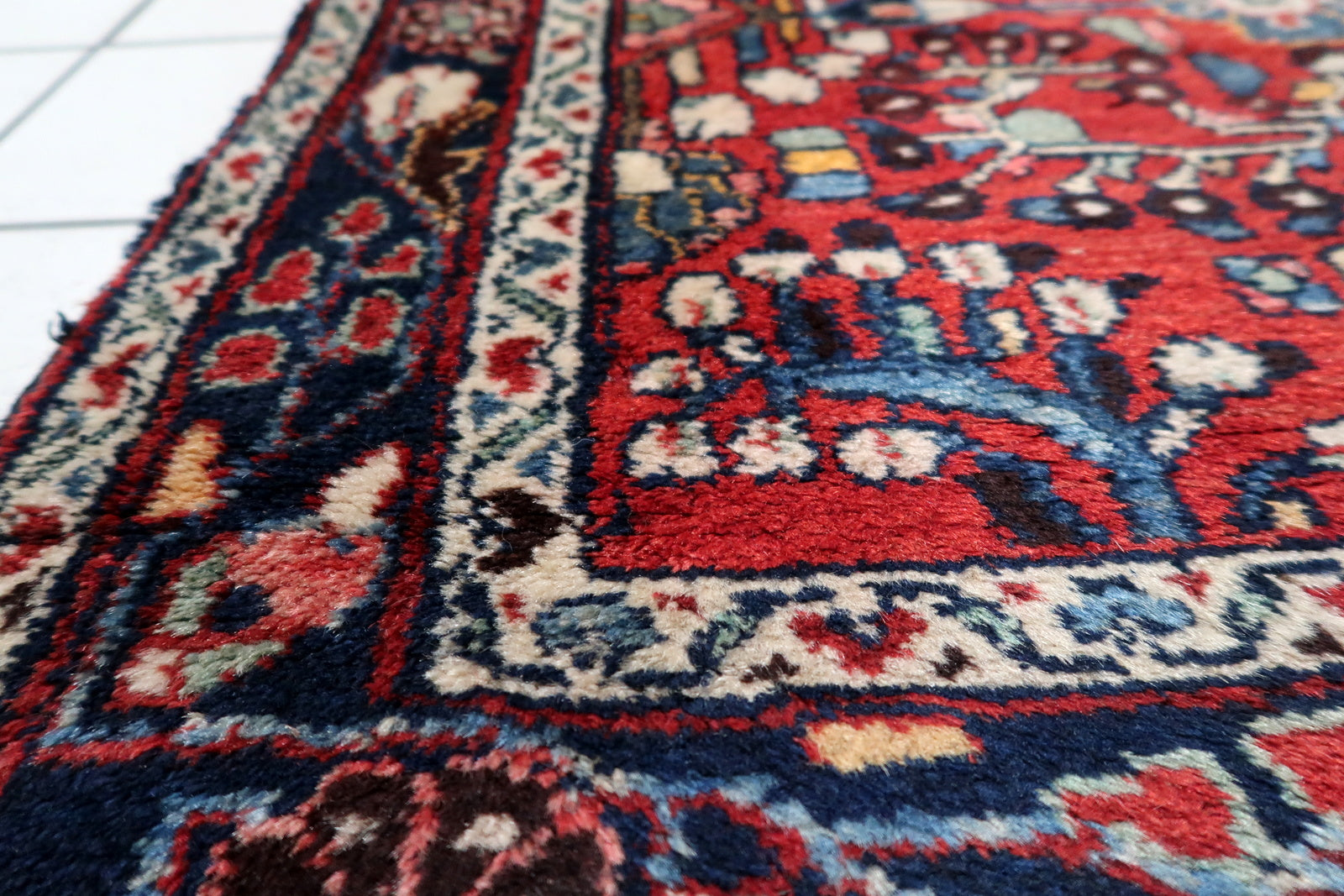 A 1920s tribal runner adding bold geometric pattern and historical character to a modern interior corridor.

