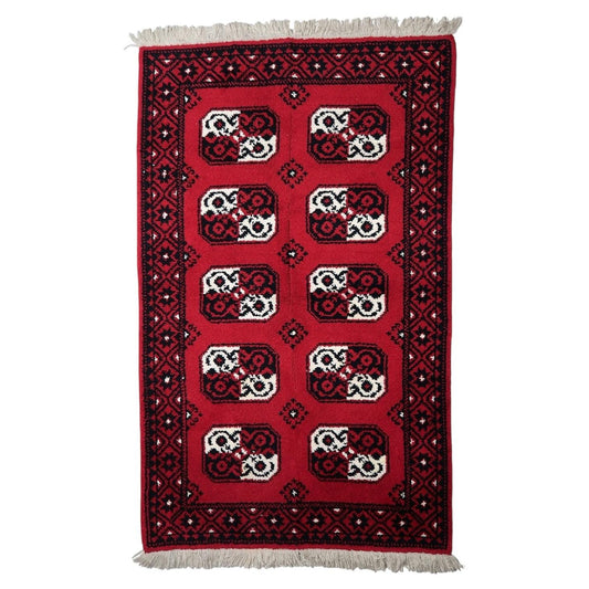 Mid-century French Savonnerie style rug, circa 1950s, hand-knotted wool featuring graphic octagonal medallions on a scarlet-red field. 144 x 230 cm.

