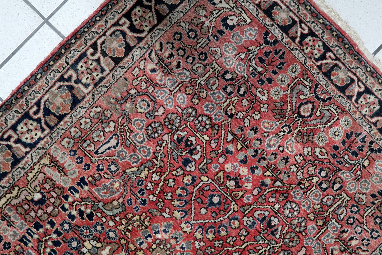 Handmade 1950s rug from Hamadan, Persia, showcasing robust craftsmanship and a timeless all-over Herati design framed by a geometric border.

