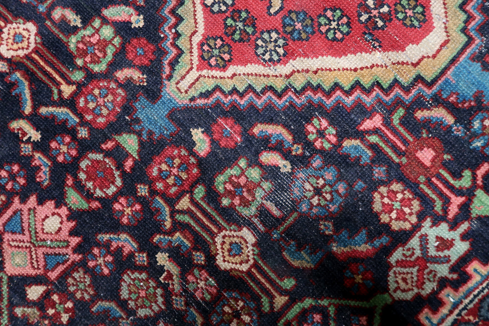 Vintage Persian carpet in good structural condition, suitable for layering in a bohemian interior or as a standalone statement piece.


