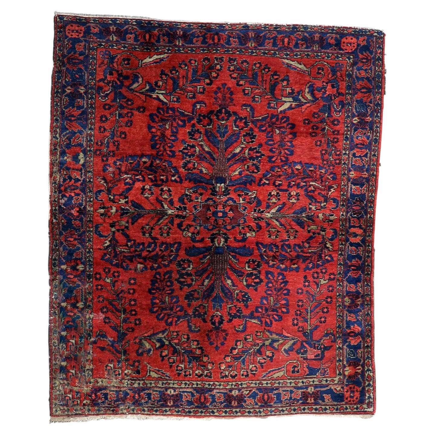 Antique Persian Lilihan rug from the 1920s, hand-knotted wool on cotton, featuring large-scale curvilinear floral motifs in the "American Sarouk" style. 173 x 200 cm.

