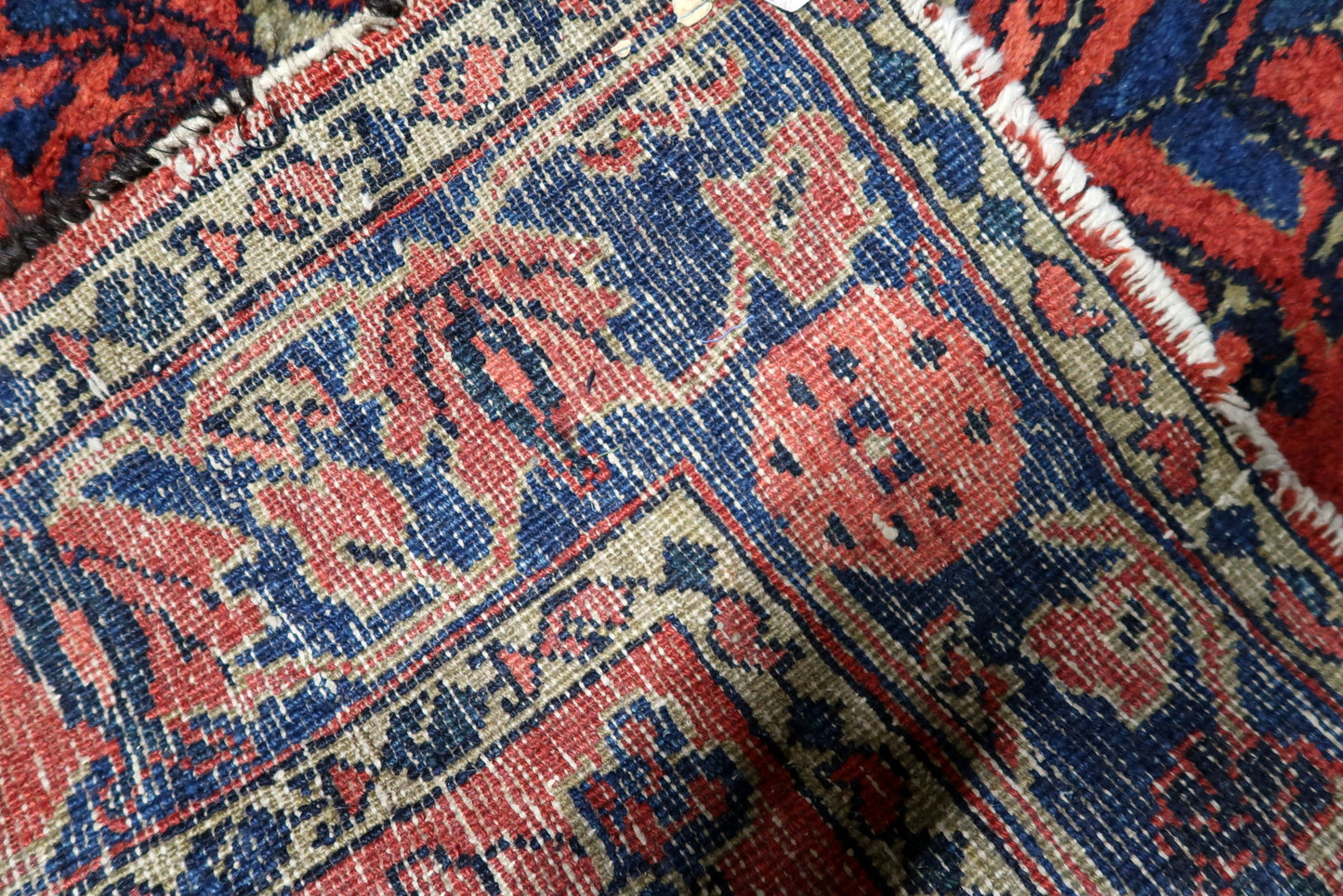 A 1920s "American Sarouk" style carpet adding elegance and historical depth to a grand foyer or formal dining space.


