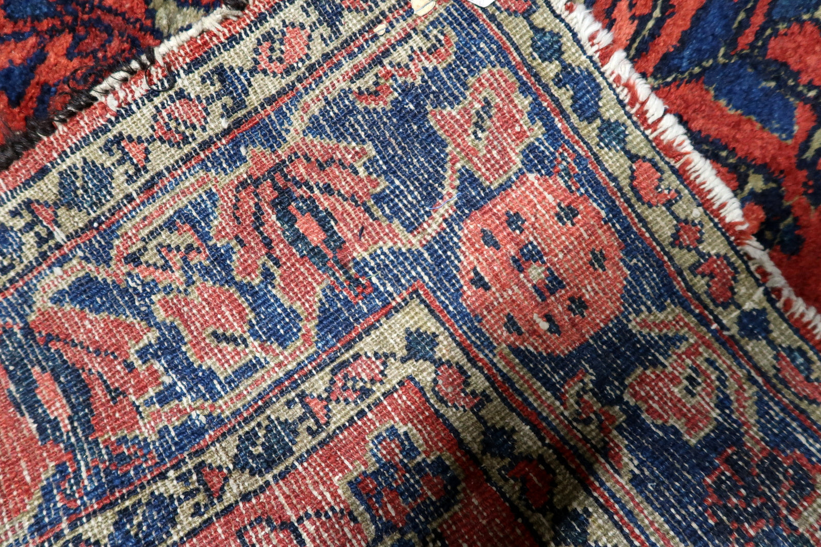 A 1920s "American Sarouk" style carpet adding elegance and historical depth to a grand foyer or formal dining space.

