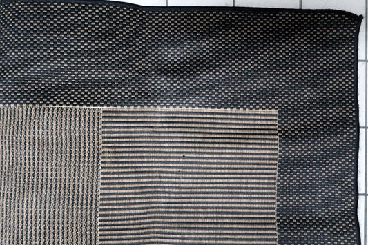 Late 20th century Belgian carpet with an architectural aesthetic, showcasing alternating textured squares with varying linear patterns. 6'7" x 9'3".

