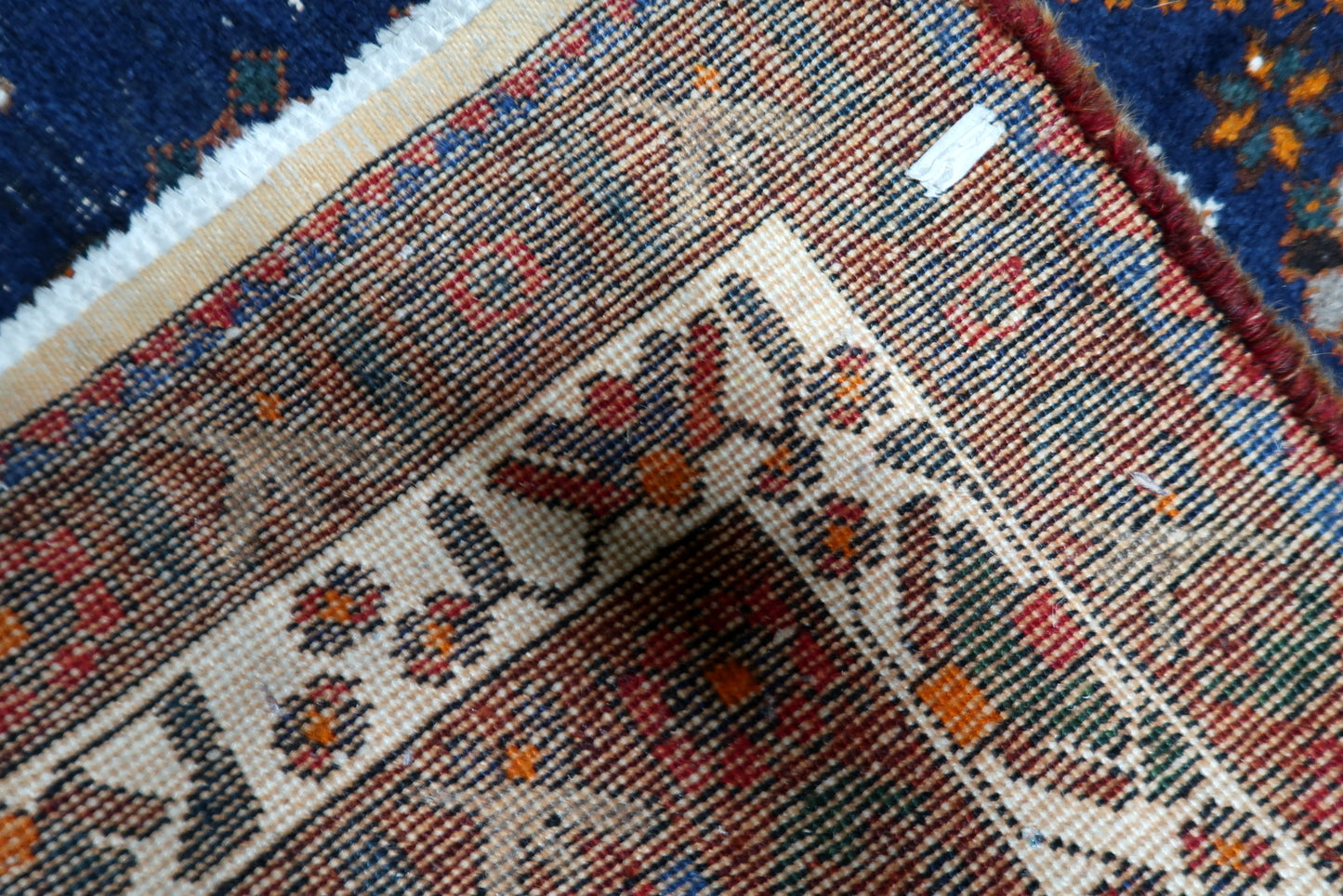 Vintage Persian rug with substantial size and authentic age-wear, perfect for designers looking to infuse a space with soulful, earthy tones.

