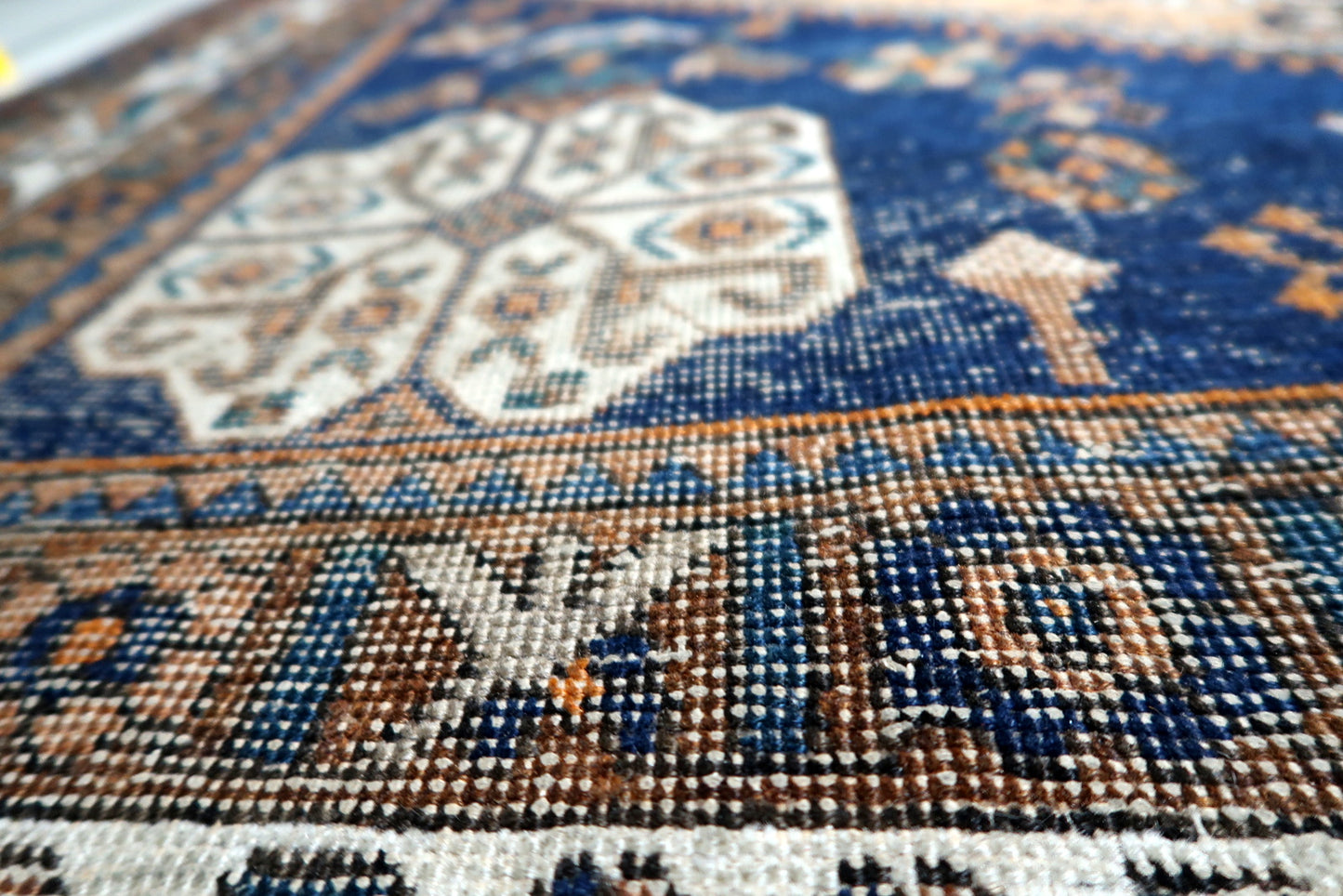 Antique Shiraz Gashkai rug, 1920s, hand-knotted wool, hexagonal medallion, tribal symbols.

