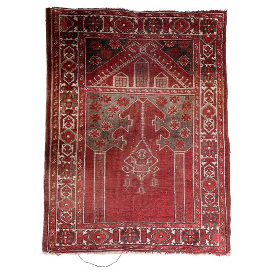 Antique Turkish Konya prayer rug from the 1920s, hand-knotted wool, featuring a warm madder-red mihrab (prayer niche) with a "Tree of Life" motif. 80 x 107 cm.

