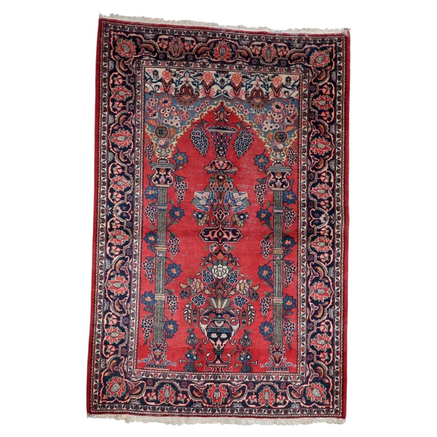 Magnificent antique 1920s Persian Kashan prayer rug with traditional Mihrab arch on madder-red field, 4.4 x 6.6 feet.

