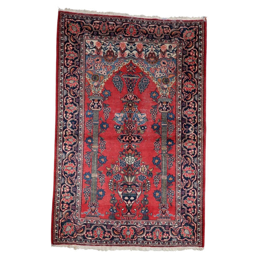 Magnificent antique 1920s Persian Kashan prayer rug with traditional Mihrab arch on madder-red field, 4.4 x 6.6 feet.

