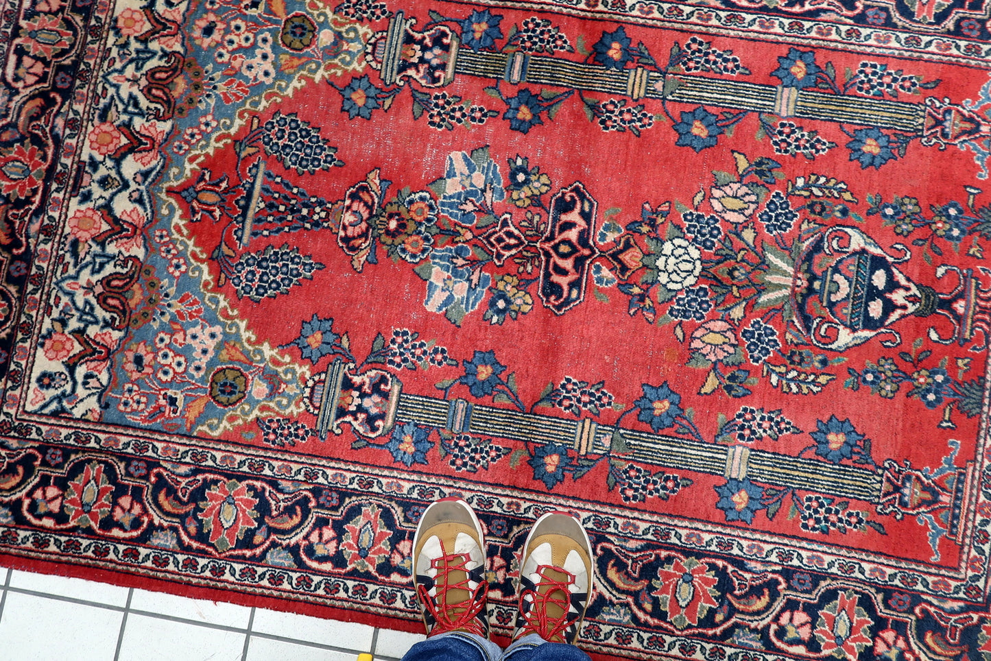 Small antique Persian prayer carpet 131 x 198 cm with well-preserved structural integrity and genuine patina.

