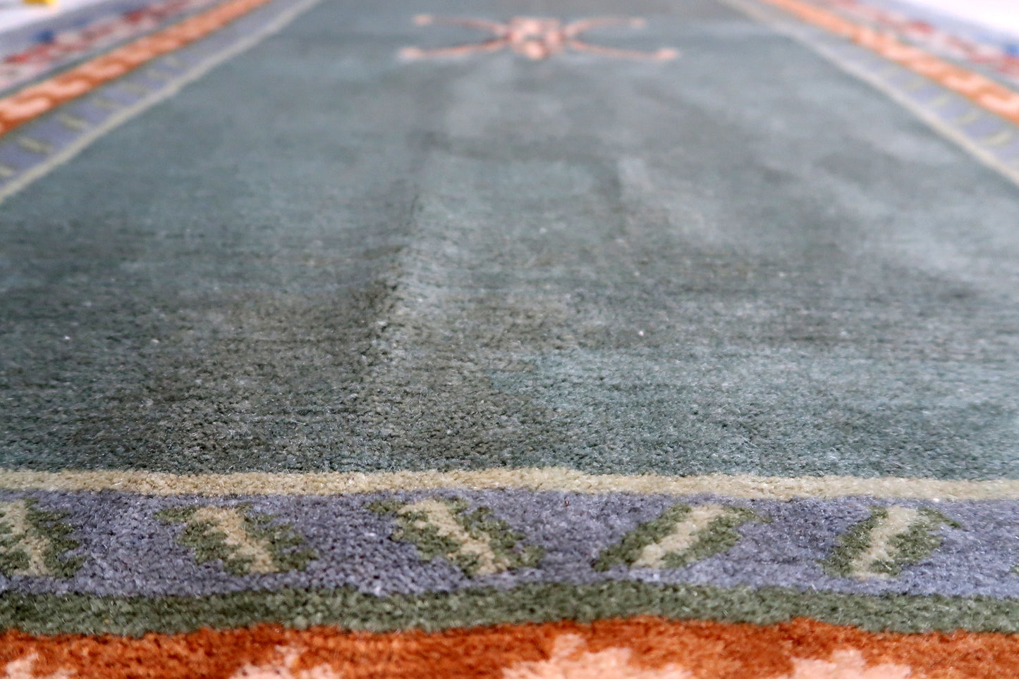 Vintage 1960s Nepal carpet with traditional Tibetan artistry fused with Art Deco sensibility and geometric patterns