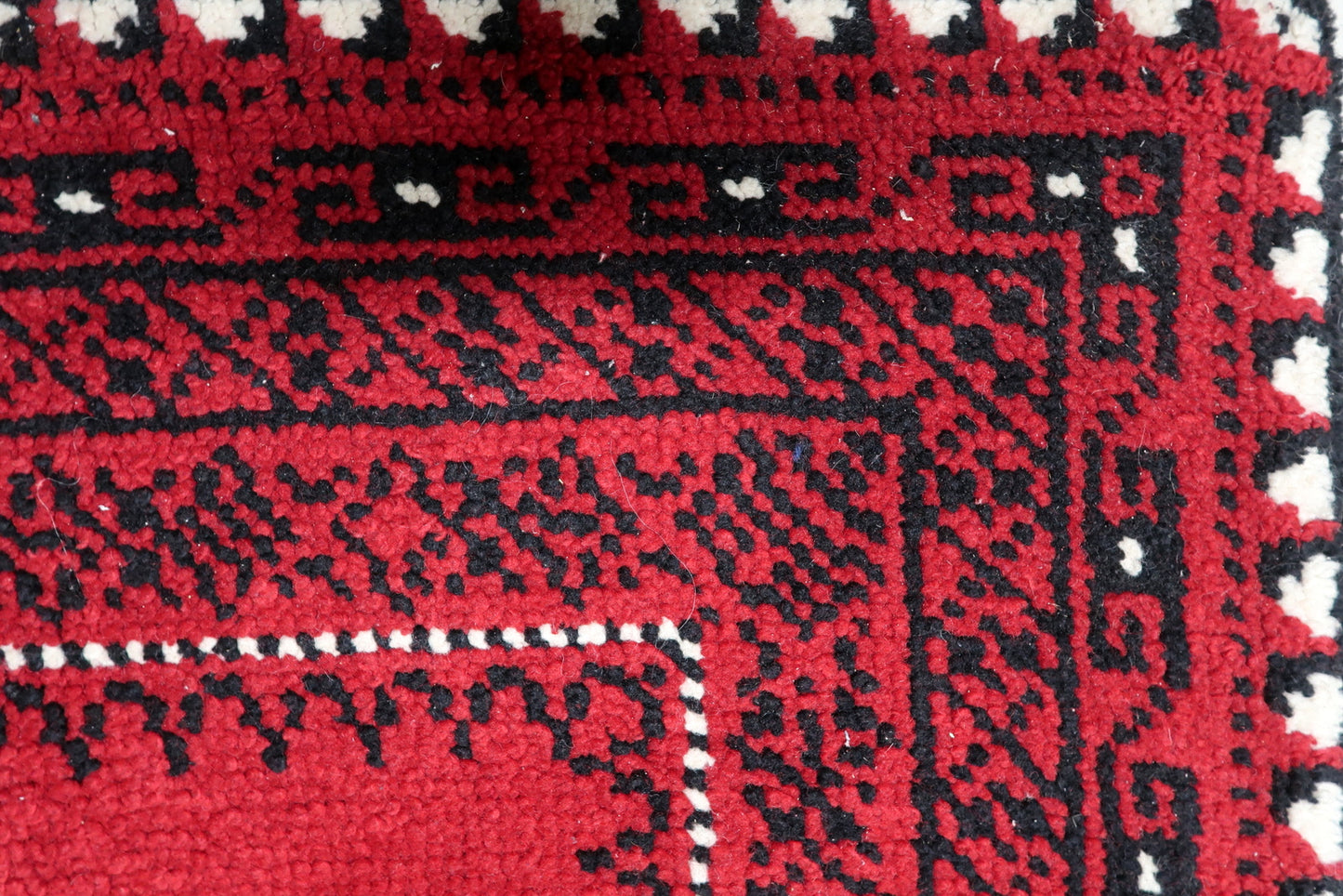 Crimson red, onyx black and ivory vintage French rug with four ornate rosettes and architectural borders