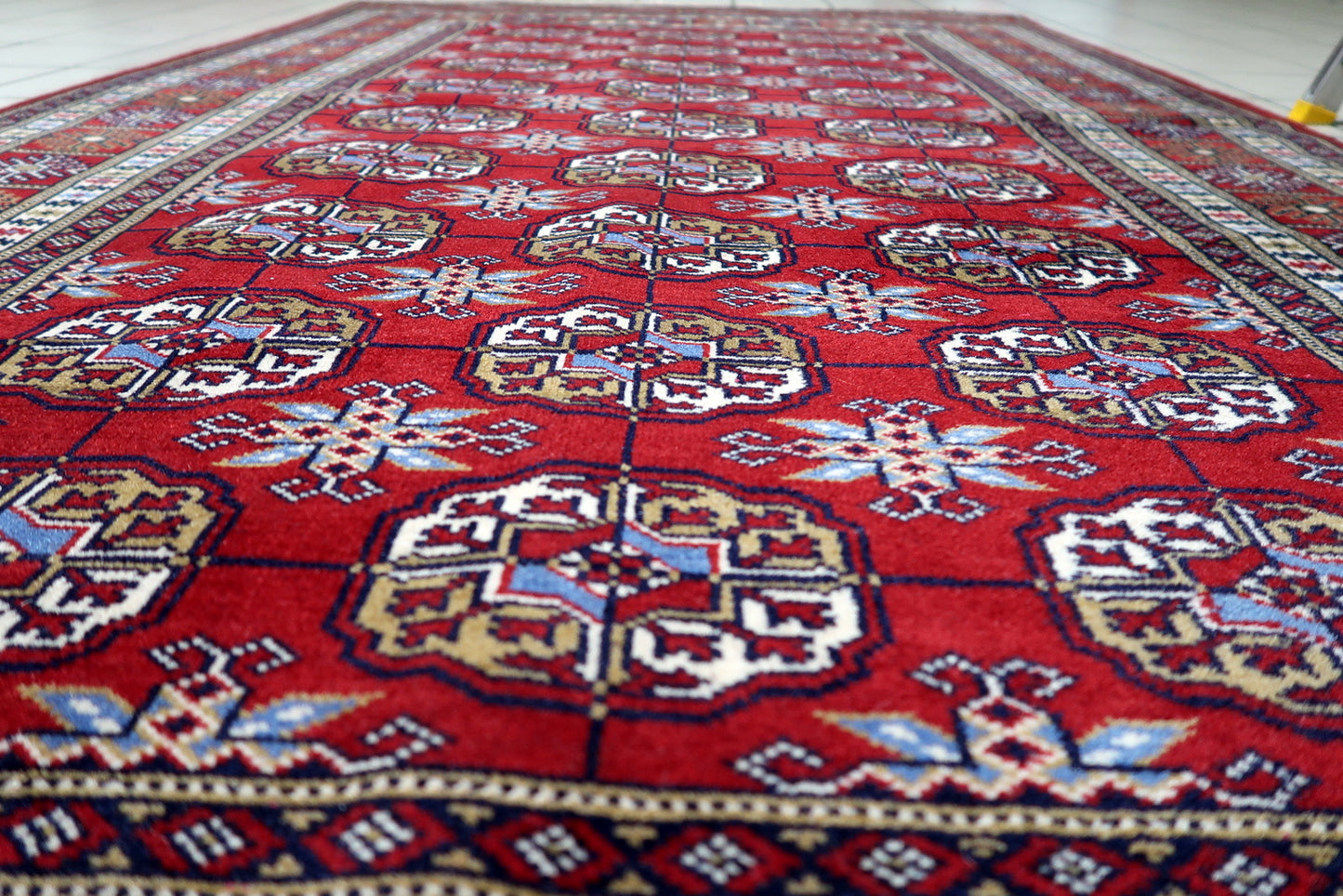 4 foot by 7 foot vintage Uzbek rug ideal for wood-paneled library or sleek modern living room