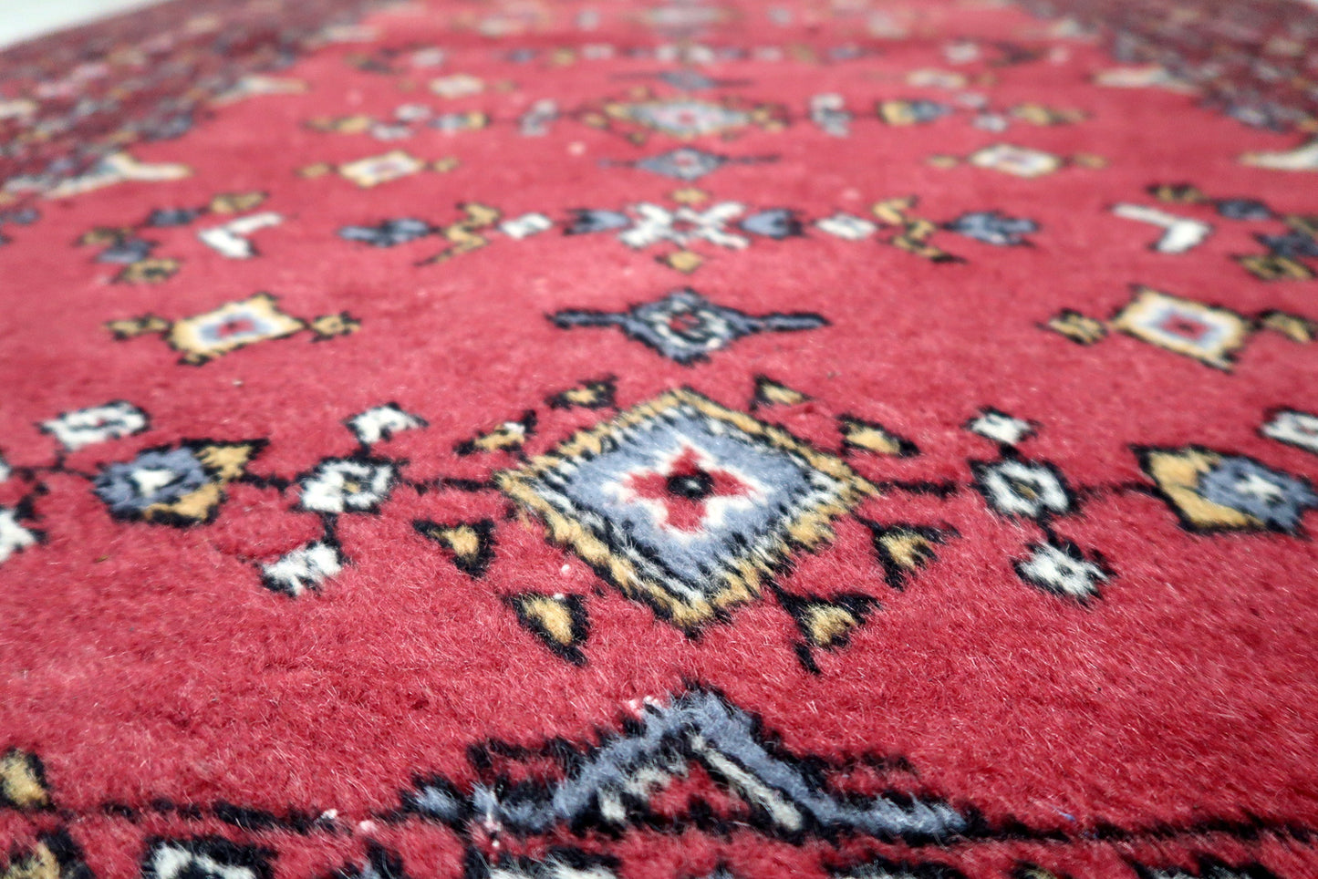 4 foot 2 by 6 foot 4 vintage Uzbek rug ideal for living rooms, studies or entryways