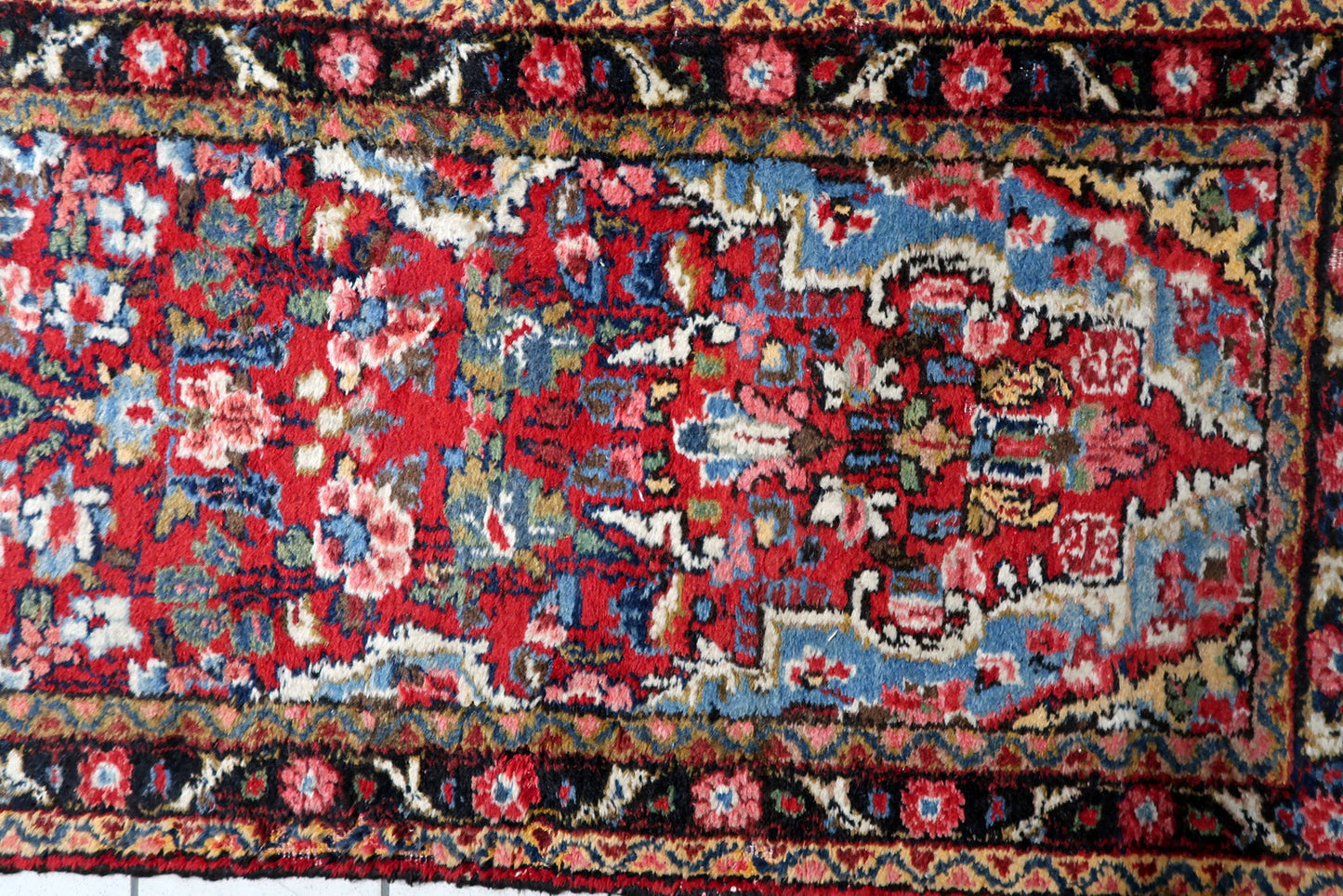 Hand-knotted antique runner distressed low pile traditional borders