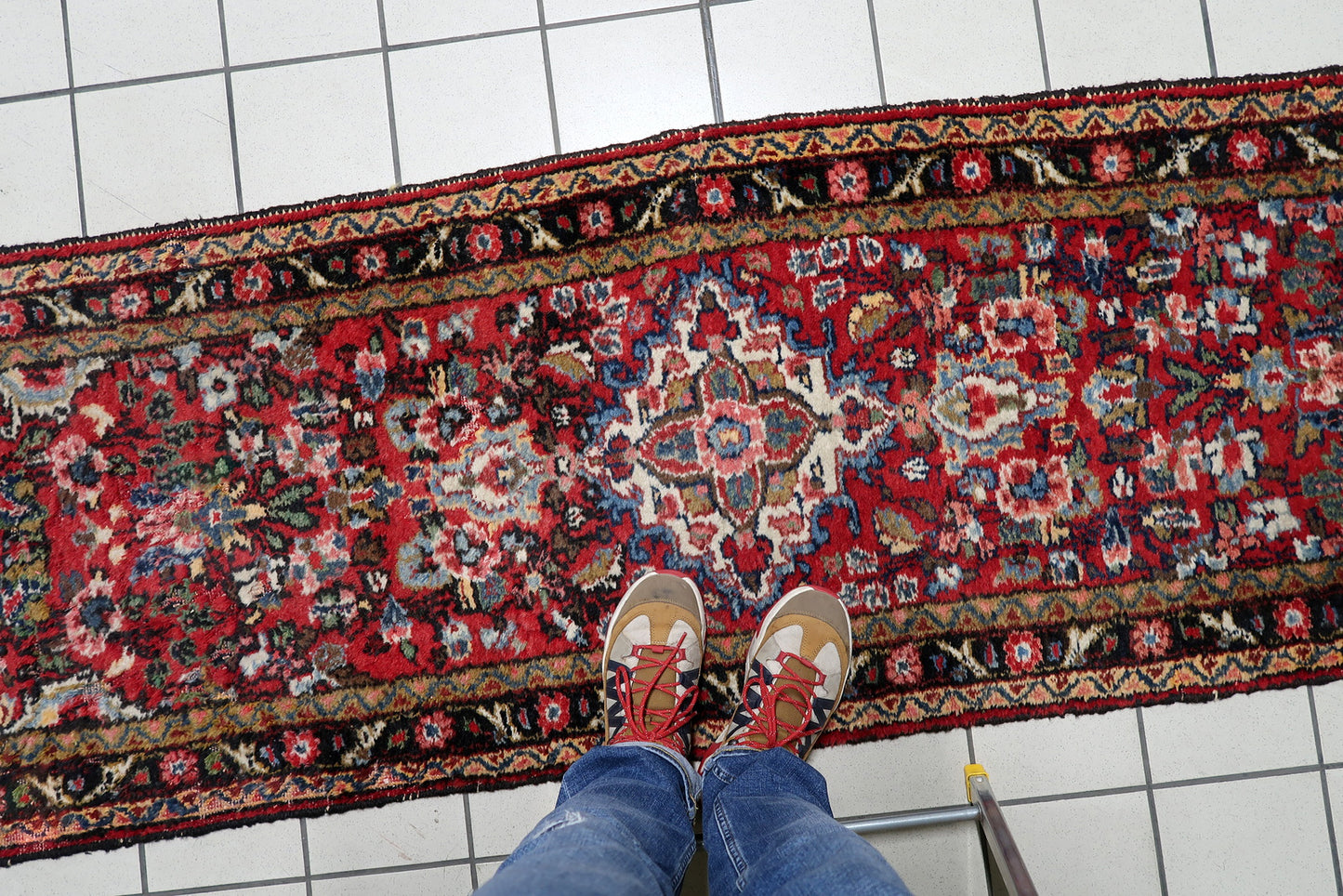 Detailed border showing traditional Hamadan village weaving with characteristic craftsmanship and aged patina