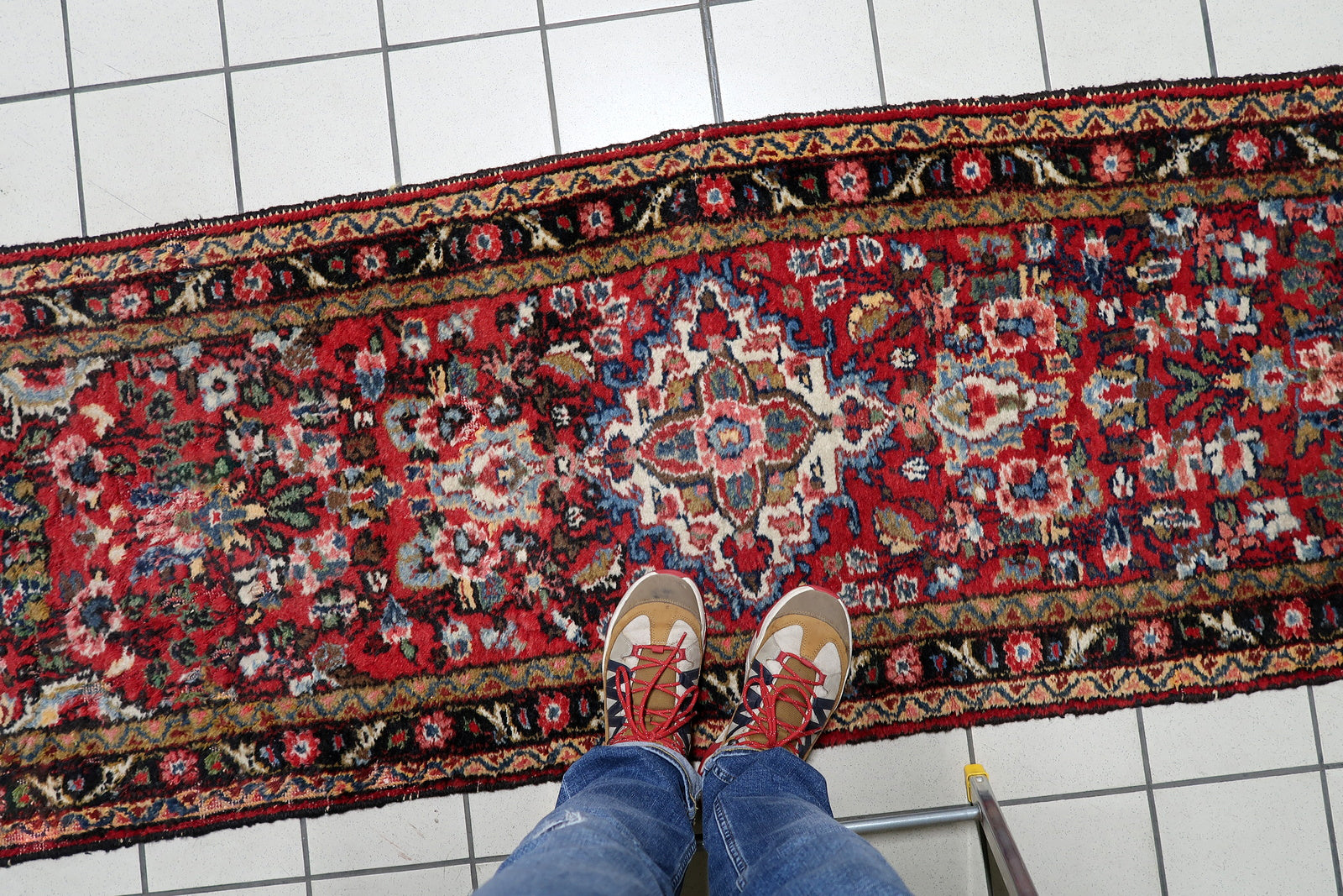 Detailed border showing traditional Hamadan village weaving with characteristic craftsmanship and aged patina