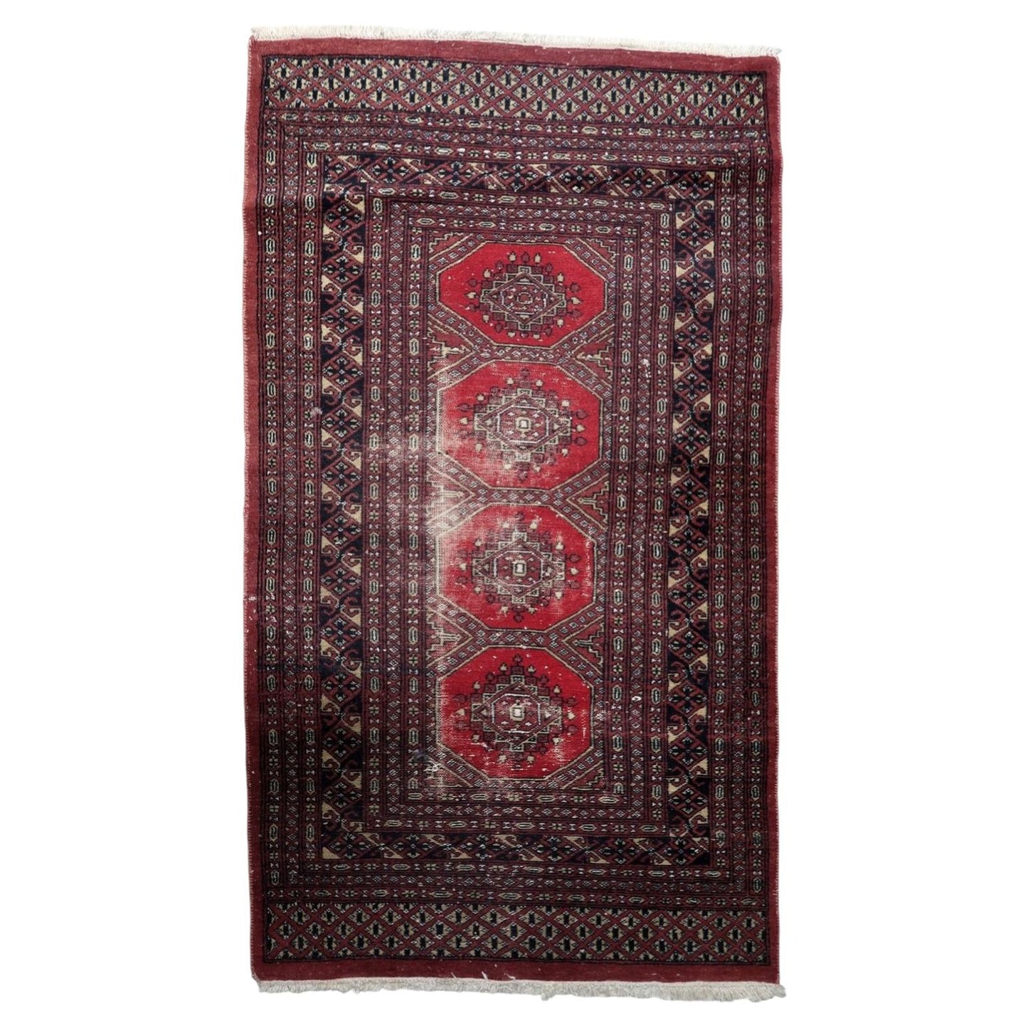 Antique Uzbek Bukhara rug 1930s distressed wool octagonal guls red brown
