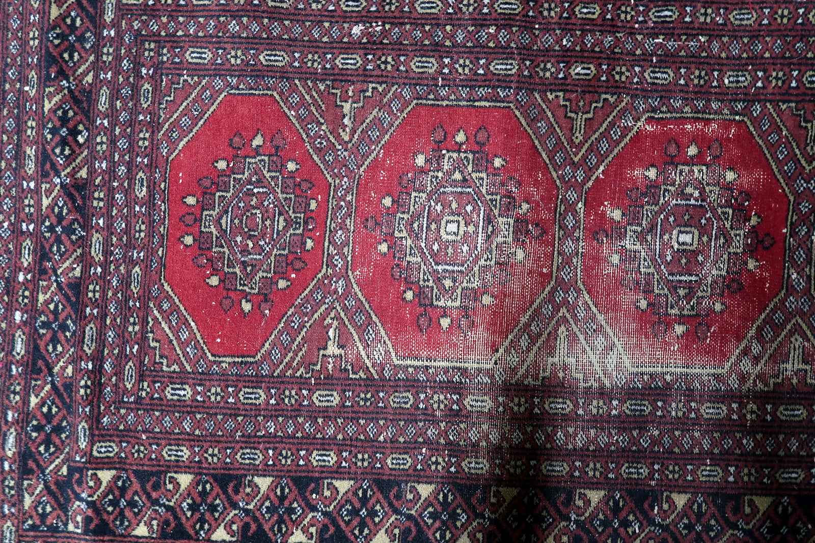 Vintage Bukhara rug 3x5 distressed warm palette entryway accent