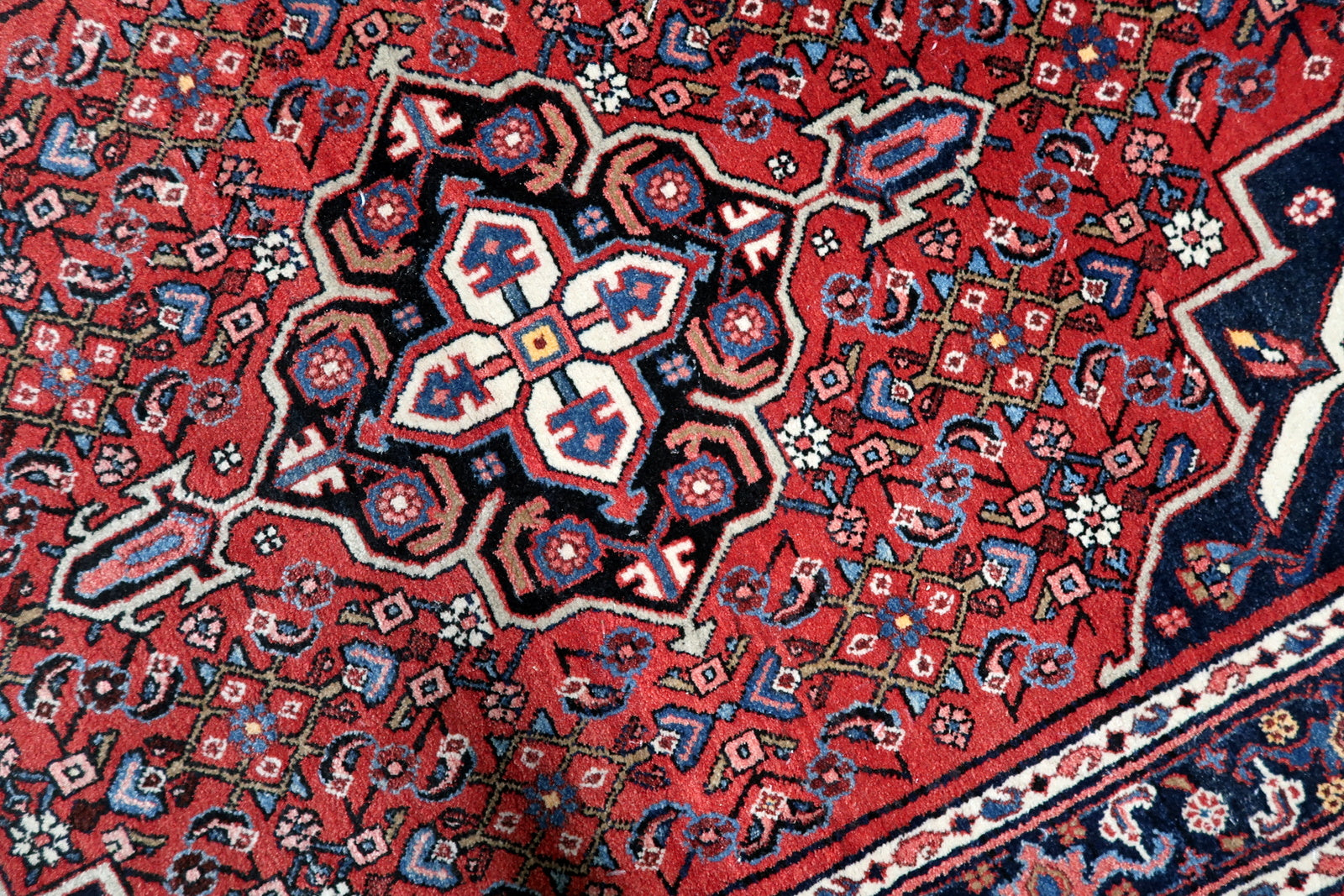 Richly detailed central medallion on mid-20th century Persian Hamadan wool rug

