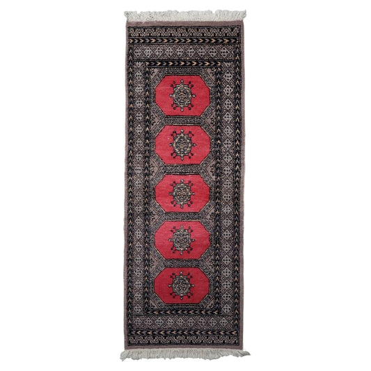 Vintage Uzbek Bukhara runner 1960s hand-knotted wool 2.1x5.6 ft full view with five octagonal guls

