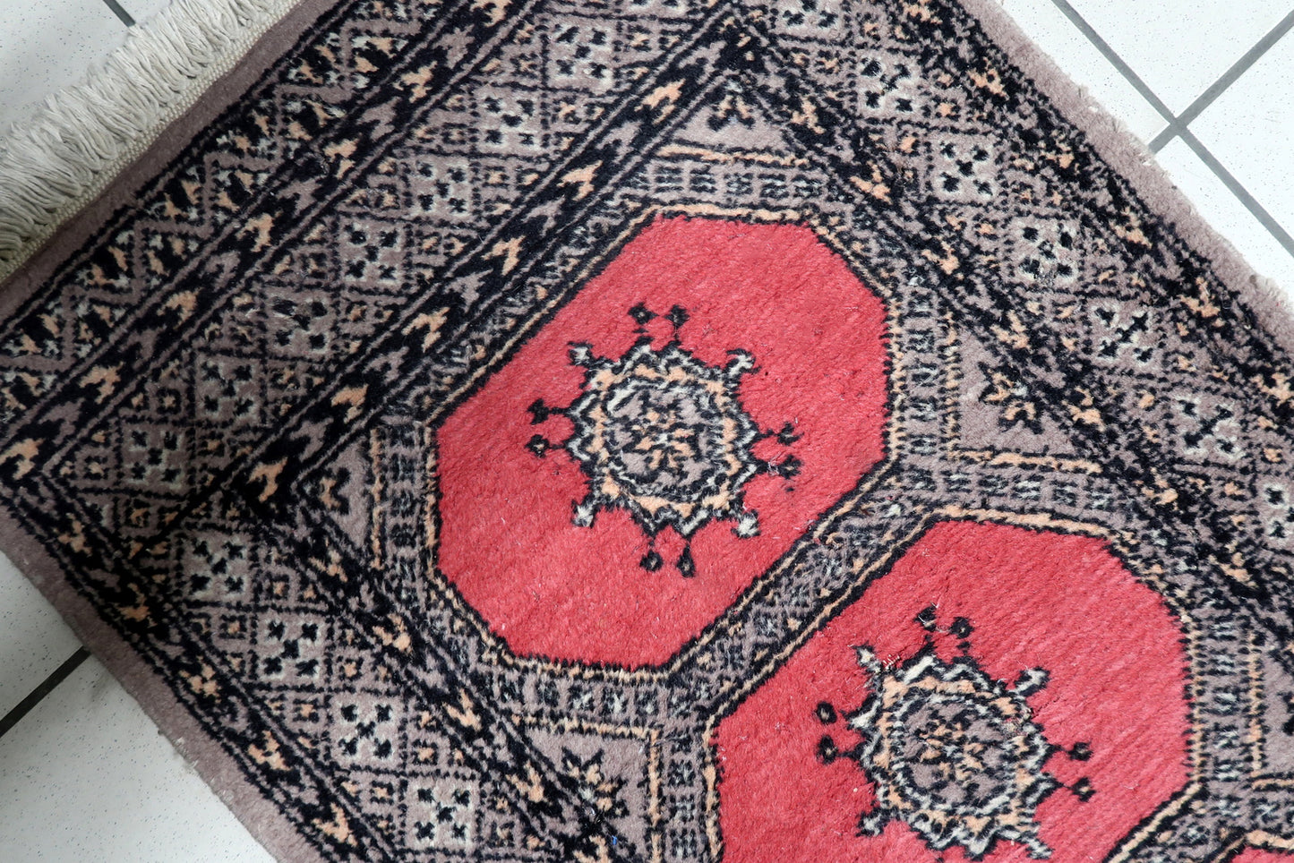 Vintage Uzbek runner texture and soft pile detail with light age-appropriate wear

