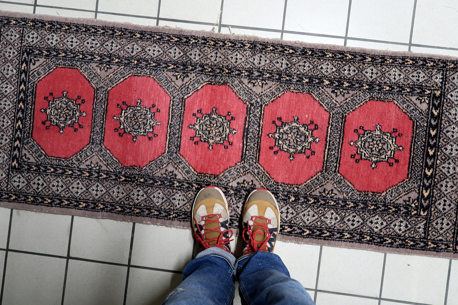 Five bold octagonal guls arranged symmetrically on mid-century Uzbek Bukhara wool runner
